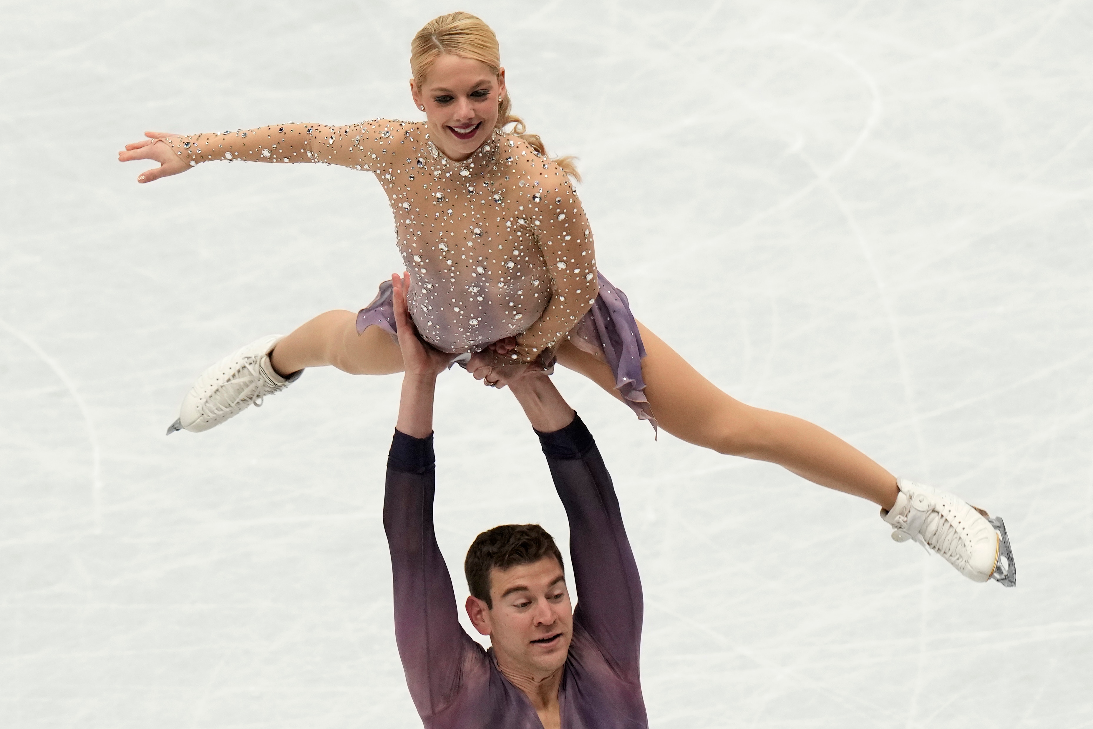 Alexa Knierim and Brandon Frazier, of the U.S, perform in the pairs free program at the Figure Skating World Championships in Montpellier, south of France, Thursday, March 24, 2022. (AP Photo/Francisco Seco)