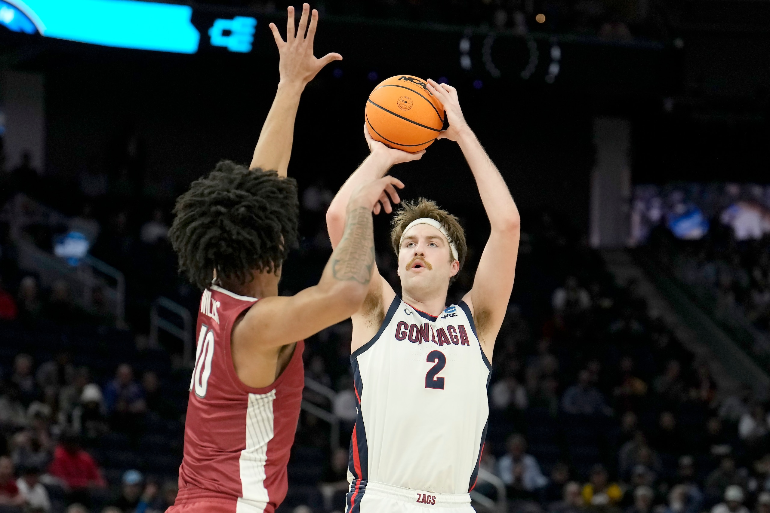 Gonzaga forward Drew Timme (2) shoots against Arkansas forward Jaylin Williams during the first half of a college basketball game in the Sweet 16 round of the NCAA tournament in San Francisco, Thursday, March 24, 2022. (AP Photo/Tony Avelar) Gonzaga forward Drew Timme (2) shoots against Arkansas forward Jaylin Williams during the first half of a college basketball game in the Sweet 16 round of the NCAA tournament in San Francisco, Thursday, March 24, 2022. (AP Photo/Tony Avelar)