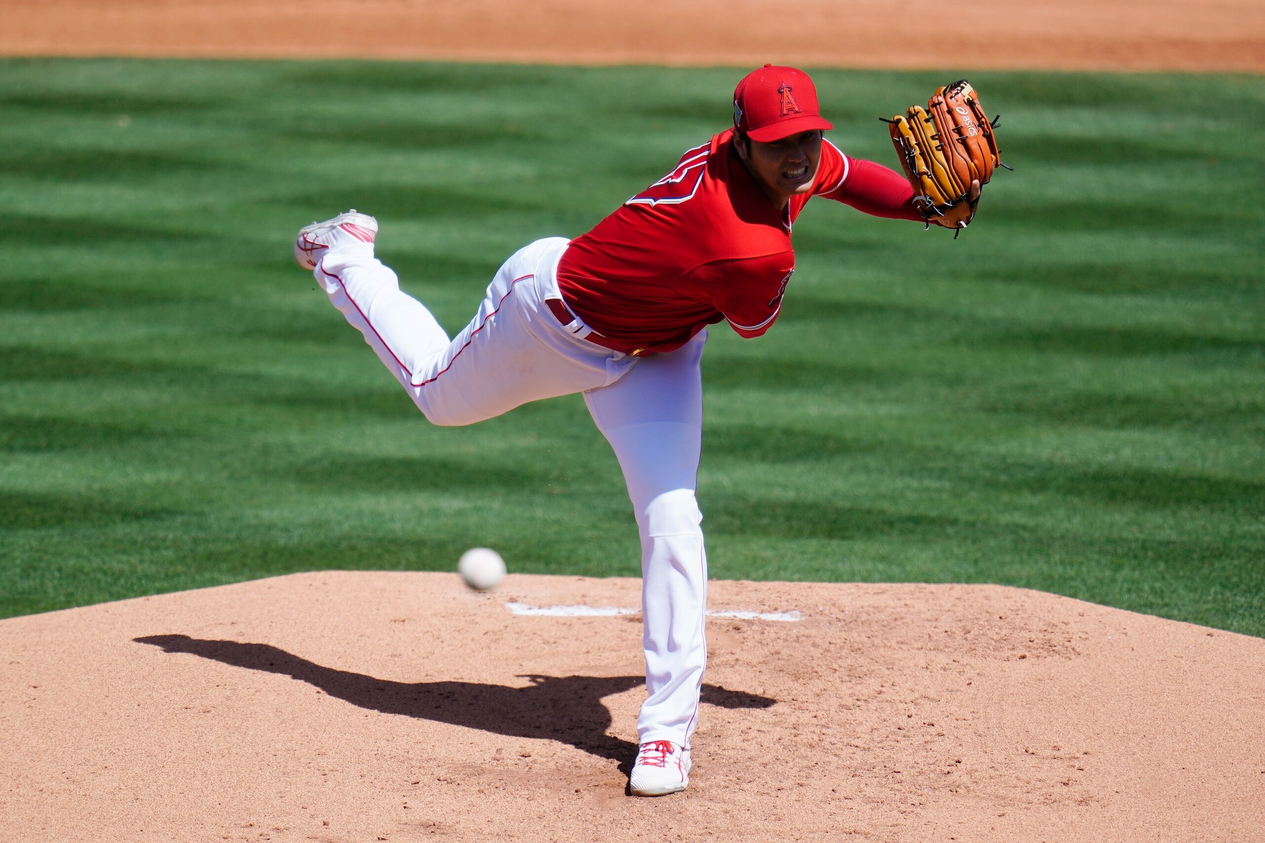 Los Angeles Angels pitcher Shohei Ohtani, of Japan, throws against the Kansas City Royals during the second inning of a spring training baseball game Monday, March 21, 2022, in Tempe, Ariz. (AP Photo/Ross D. Franklin)