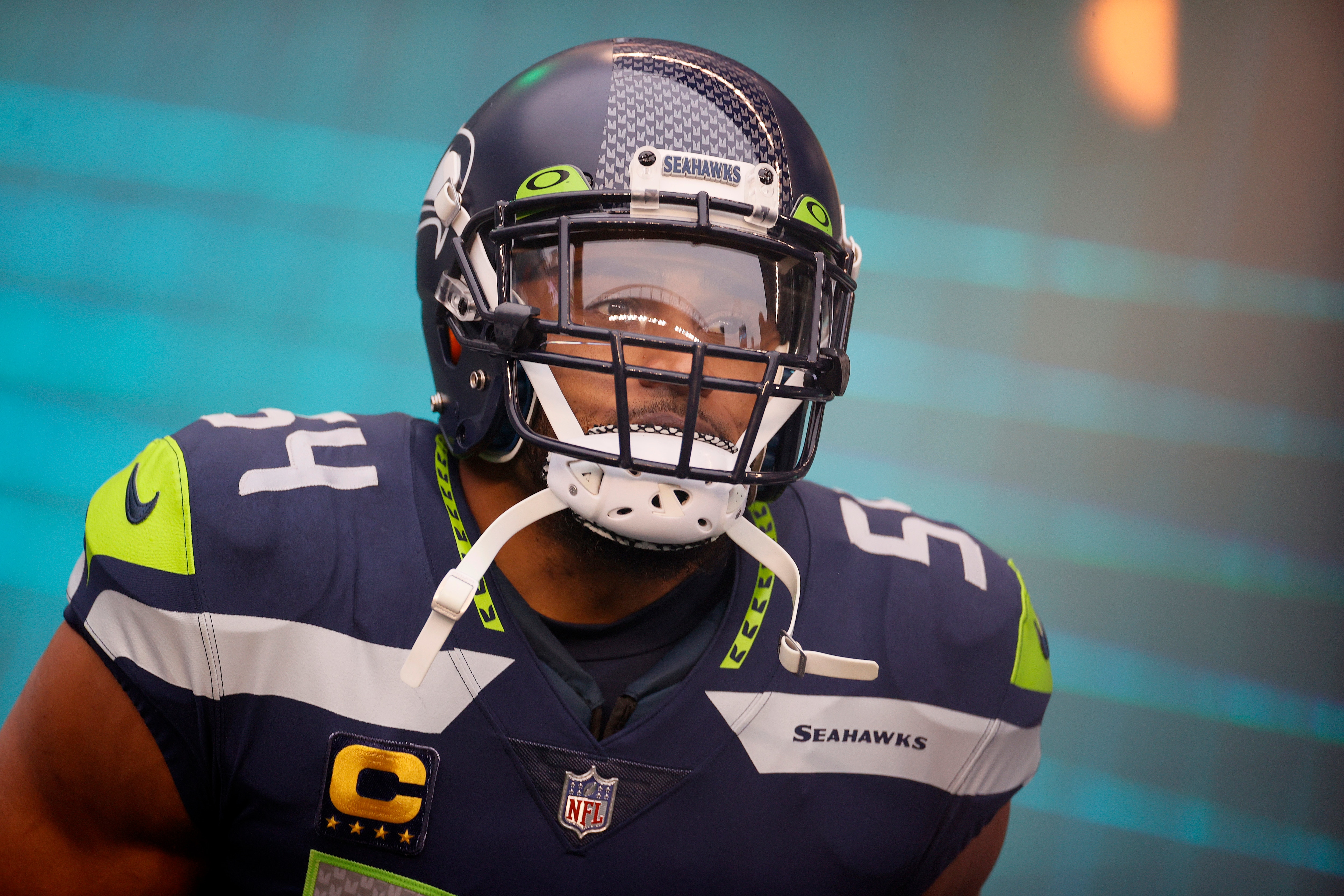 SEATTLE, WASHINGTON - JANUARY 02: Bobby Wagner #54 of the Seattle Seahawks runs onto the field during player introductions before the game against the Detroit Lions at Lumen Field on January 02, 2022 in Seattle, Washington. (Photo by Steph Chambers/Getty Images)