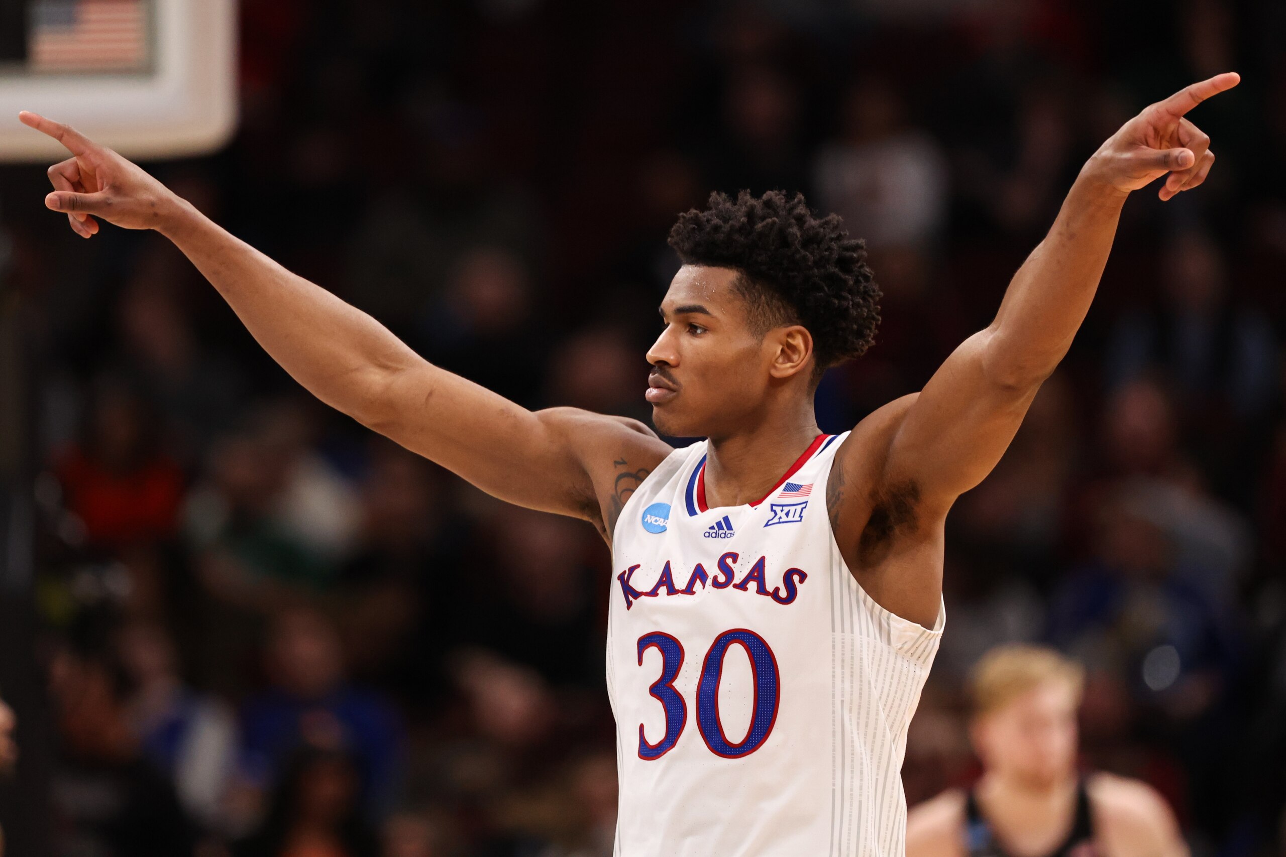 CHICAGO, IL - MARCH 25: Ochai Agbaji #30 of the Kansas Jayhawks reacts against the Providence Friars during the Sweet 16 round of the 2022 NCAA Mens Basketball Tournament held at United Center on March 25, 2022 in Chicago, Illinois. (Photo by Isaiah Vazquez/NCAA Photos via Getty Images)