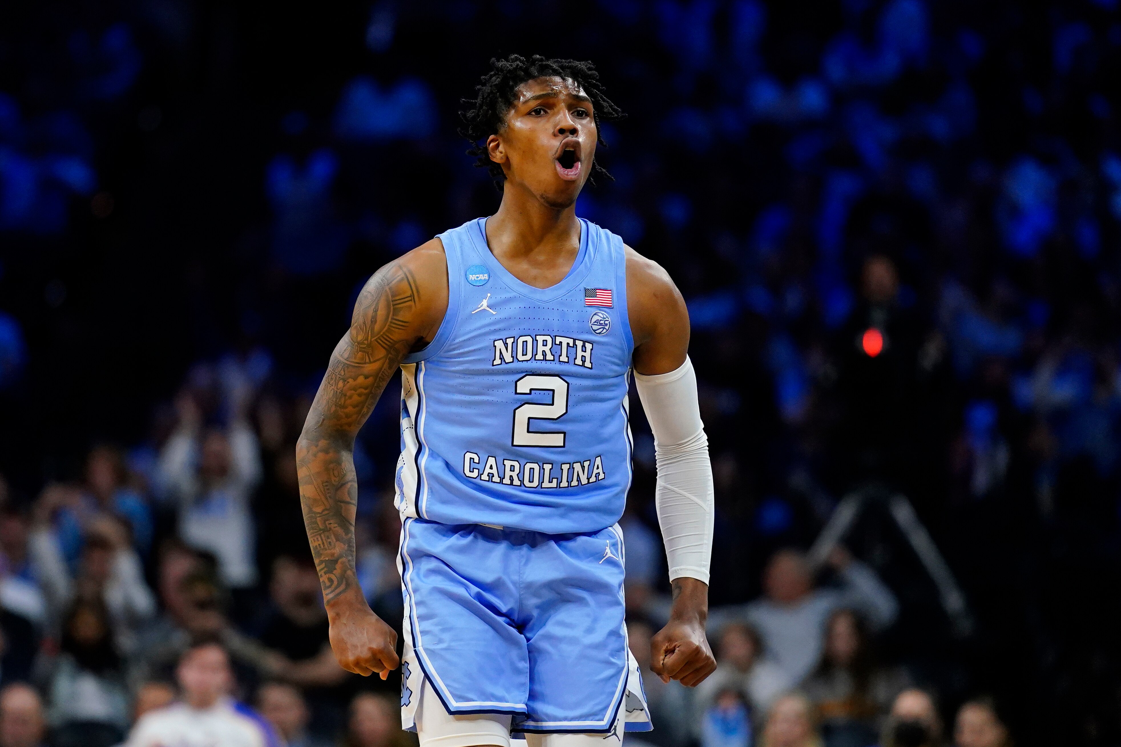 North Carolina's Caleb Love reacts during the second half of a college basketball game against UCLA in the Sweet 16 round of the NCAA tournament, Friday, March 25, 2022, in Philadelphia. (AP Photo/Matt Rourke)