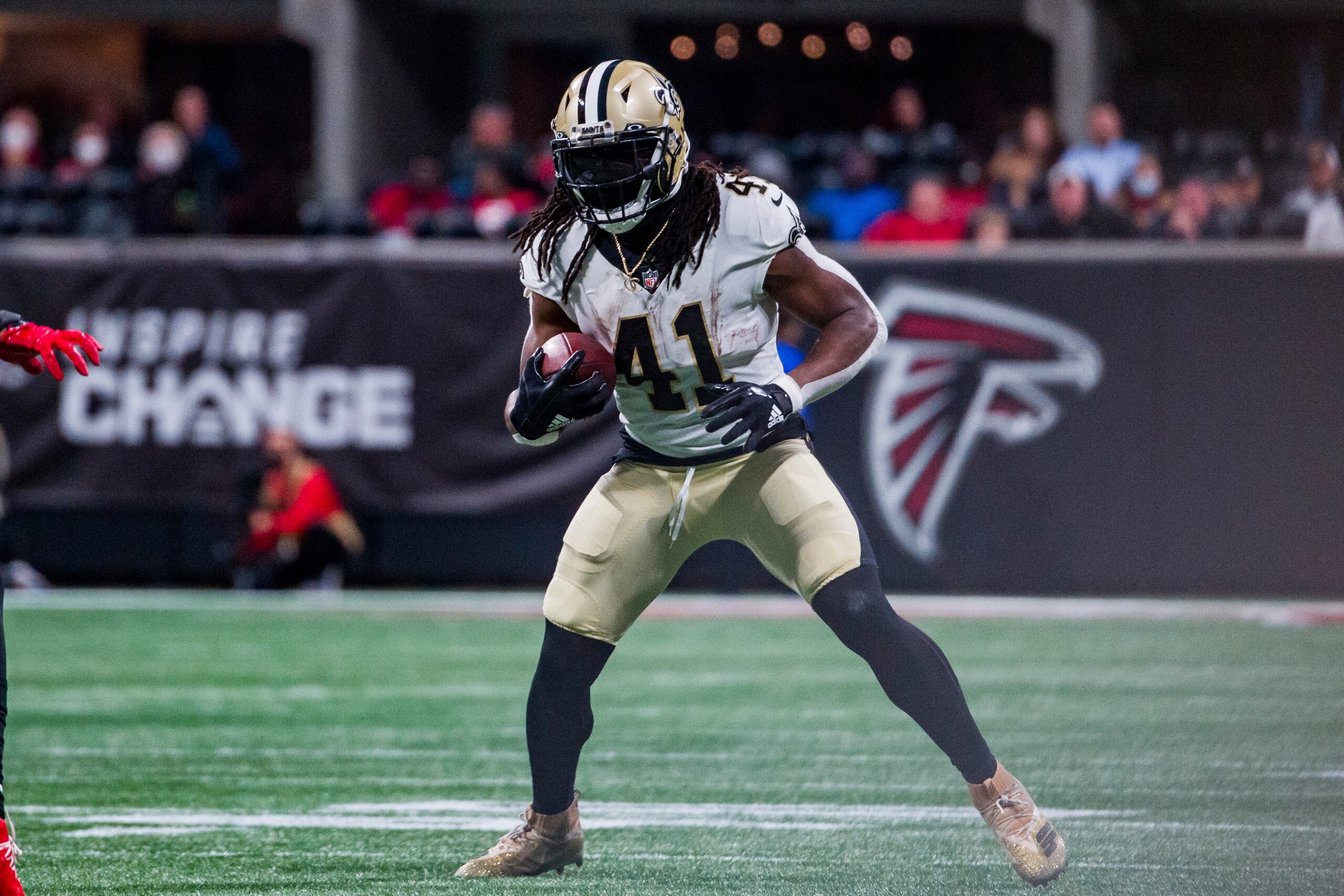 New Orleans Saints running back Alvin Kamara (41) catches a pass during the first half of an NFL football game against the Atlanta Falcons, Sunday, Jan. 9, 2022, in Atlanta. The New Orleans Saints won 30-20. (AP Photo/Danny Karnik)