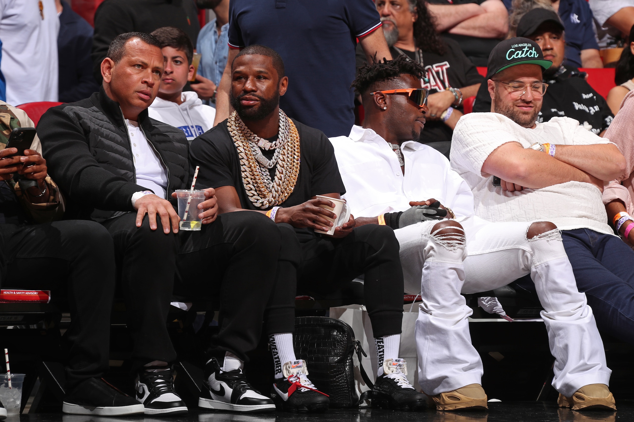 MIAMI, FL - FEBRUARY 26: Former MLB player, Alex Rodriguez, Boxer, Floyd Mayweather and NFL player, Antonio Brown attend the game between the San Antonio Spurs and the Memphis Grizzlies on February 26, 2022 at FTX Arena in Miami, Florida. NOTE TO USER: User expressly acknowledges and agrees that, by downloading and or using this Photograph, user is consenting to the terms and conditions of the Getty Images License Agreement. Mandatory Copyright Notice: Copyright 2022 NBAE (Photo by Issac Baldizon/NBAE via Getty Images)