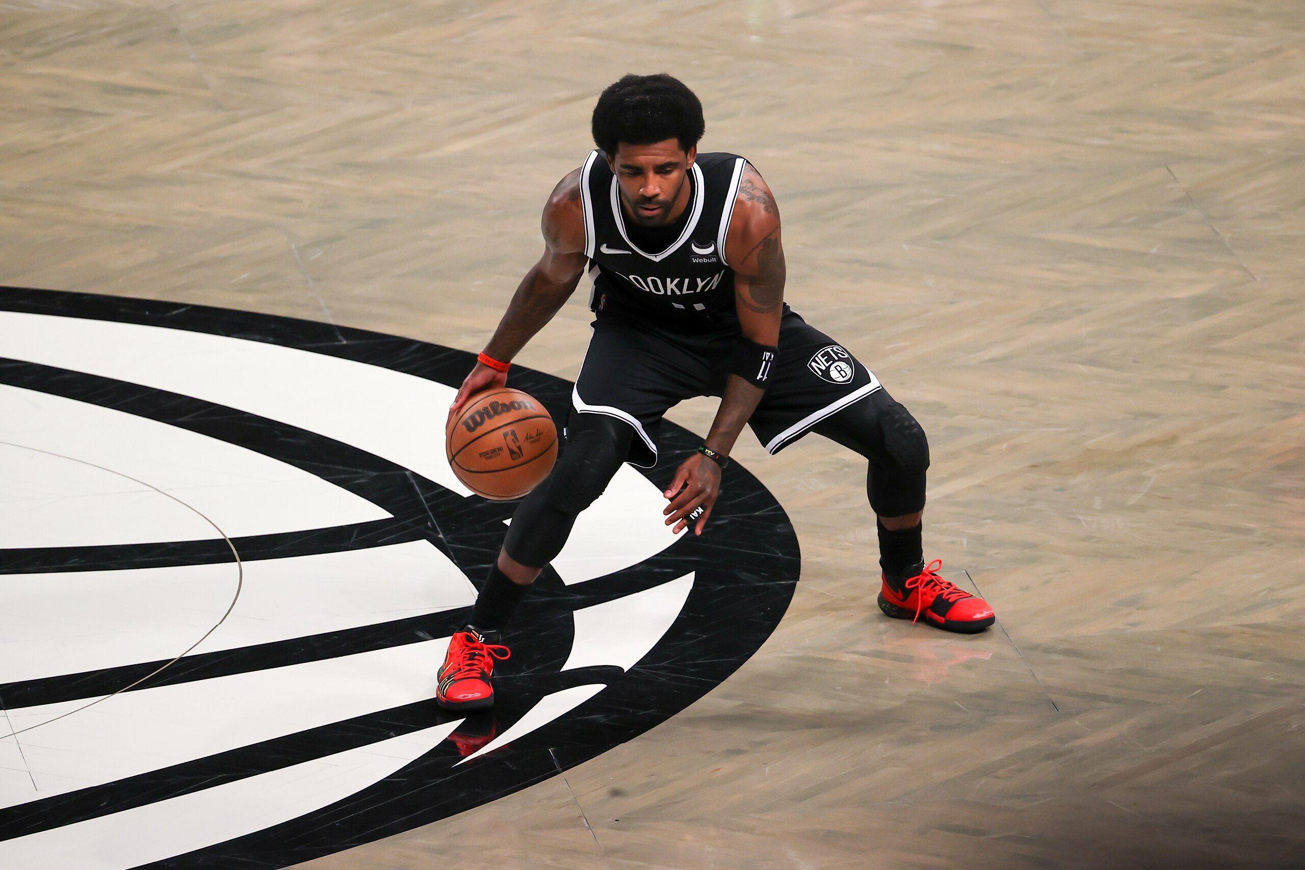 NEW YORK, NY - MARCH 27: Kyrie Irving of Brooklyn Nets is seen in action during NBA match between Brooklyn Nets and Charlotte Hornets at the Barclays Center in Brooklyn of New York City, United States on March 27, 2022. New York City Mayor Eric Adams announced Thursday the removal of the private sector mandate, clearing the way for Irving to play at Barclays Center and eventually become a full-time player. (Photo by Tayfun Coskun/Anadolu Agency via Getty Images) NEW YORK, NY - MARCH 27: Kyrie Irving of Brooklyn Nets is seen in action during NBA match between Brooklyn Nets and Charlotte Hornets at the Barclays Center in Brooklyn of New York City, United States on March 27, 2022. New York City Mayor Eric Adams announced Thursday the removal of the private sector mandate, clearing the way for Irving to play at Barclays Center and eventually become a full-time player. (Photo by Tayfun Coskun/Anadolu Agency via Getty Images)