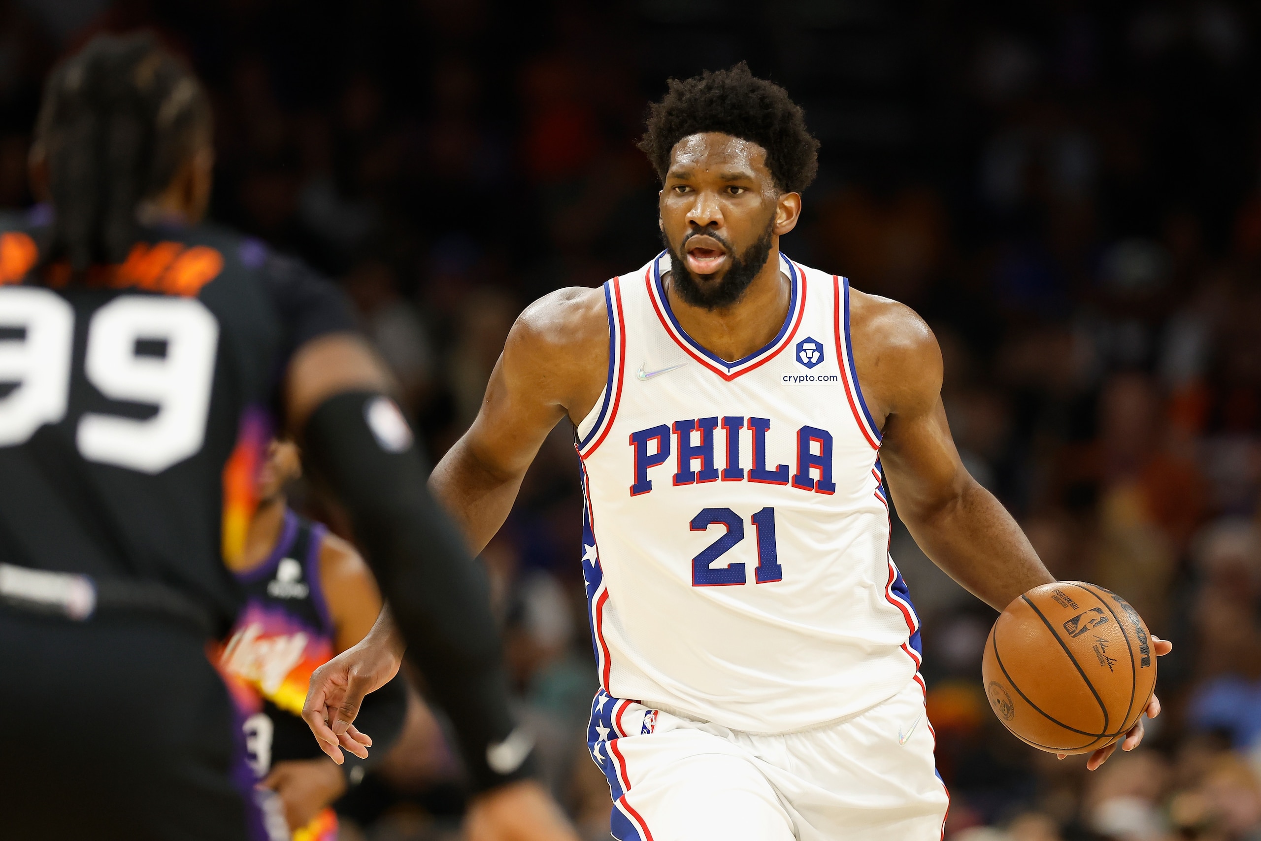 PHOENIX, ARIZONA - MARCH 27: Joel Embiid #21 of the Philadelphia 76ers handles the ball during the first half of the NBA game against the Phoenix Suns at Footprint Center on March 27, 2022 in Phoenix, Arizona. NOTE TO USER: User expressly acknowledges and agrees that, by downloading and or using this photograph, User is consenting to the terms and conditions of the Getty Images License Agreement. (Photo by Christian Petersen/Getty Images) PHOENIX, ARIZONA - MARCH 27: Joel Embiid #21 of the Philadelphia 76ers handles the ball during the first half of the NBA game against the Phoenix Suns at Footprint Center on March 27, 2022 in Phoenix, Arizona. NOTE TO USER: User expressly acknowledges and agrees that, by downloading and or using this photograph, User is consenting to the terms and conditions of the Getty Images License Agreement. (Photo by Christian Petersen/Getty Images)