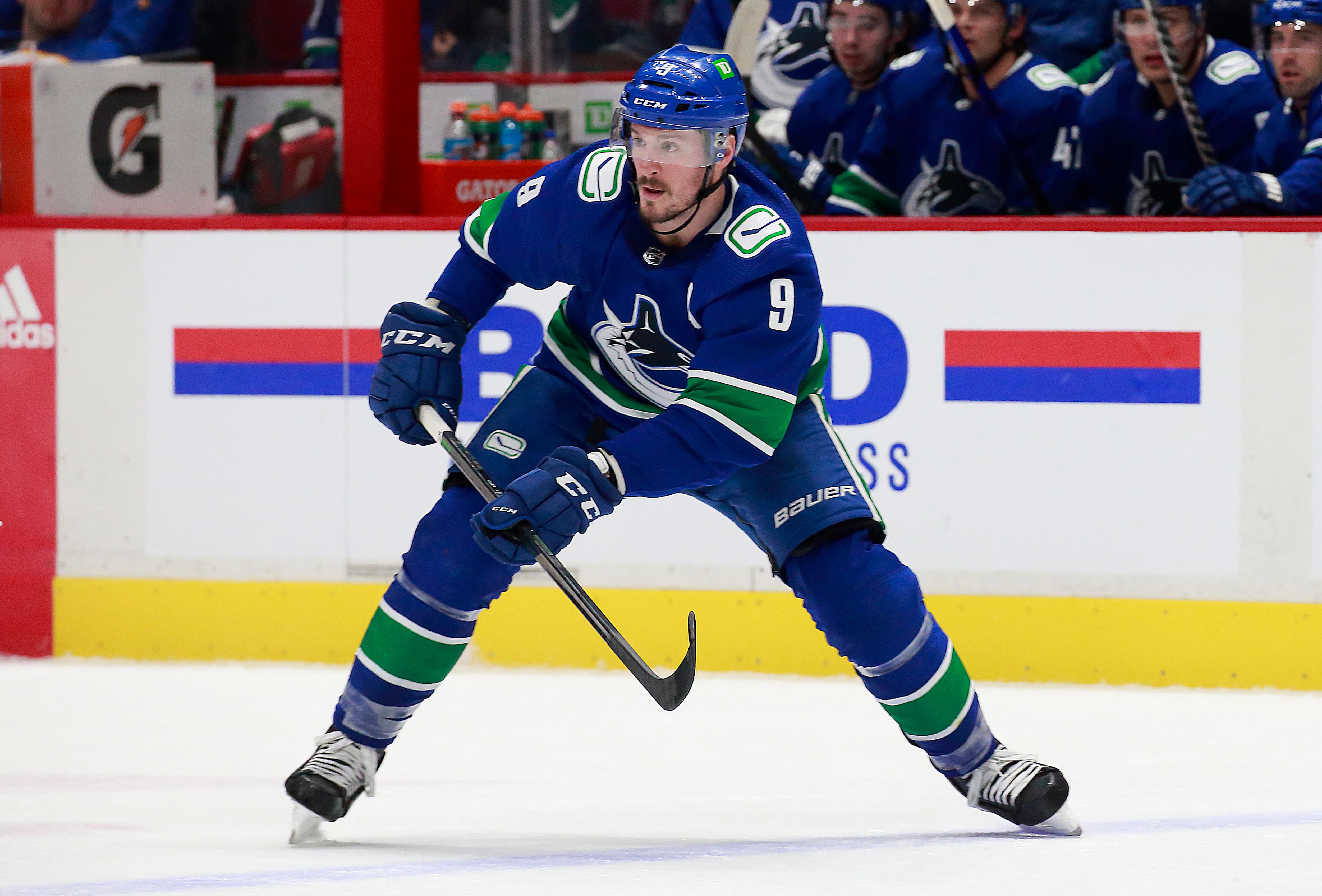 VANCOUVER, BC - MARCH 20: J.T. Miller #9 of the Vancouver Canucks skates up the ice during their NHL game against the Buffalo Sabres at Rogers Arena March 20, 2022 in Vancouver, British Columbia, Canada.  (Photo by Jeff Vinnick/NHLI via Getty Images)