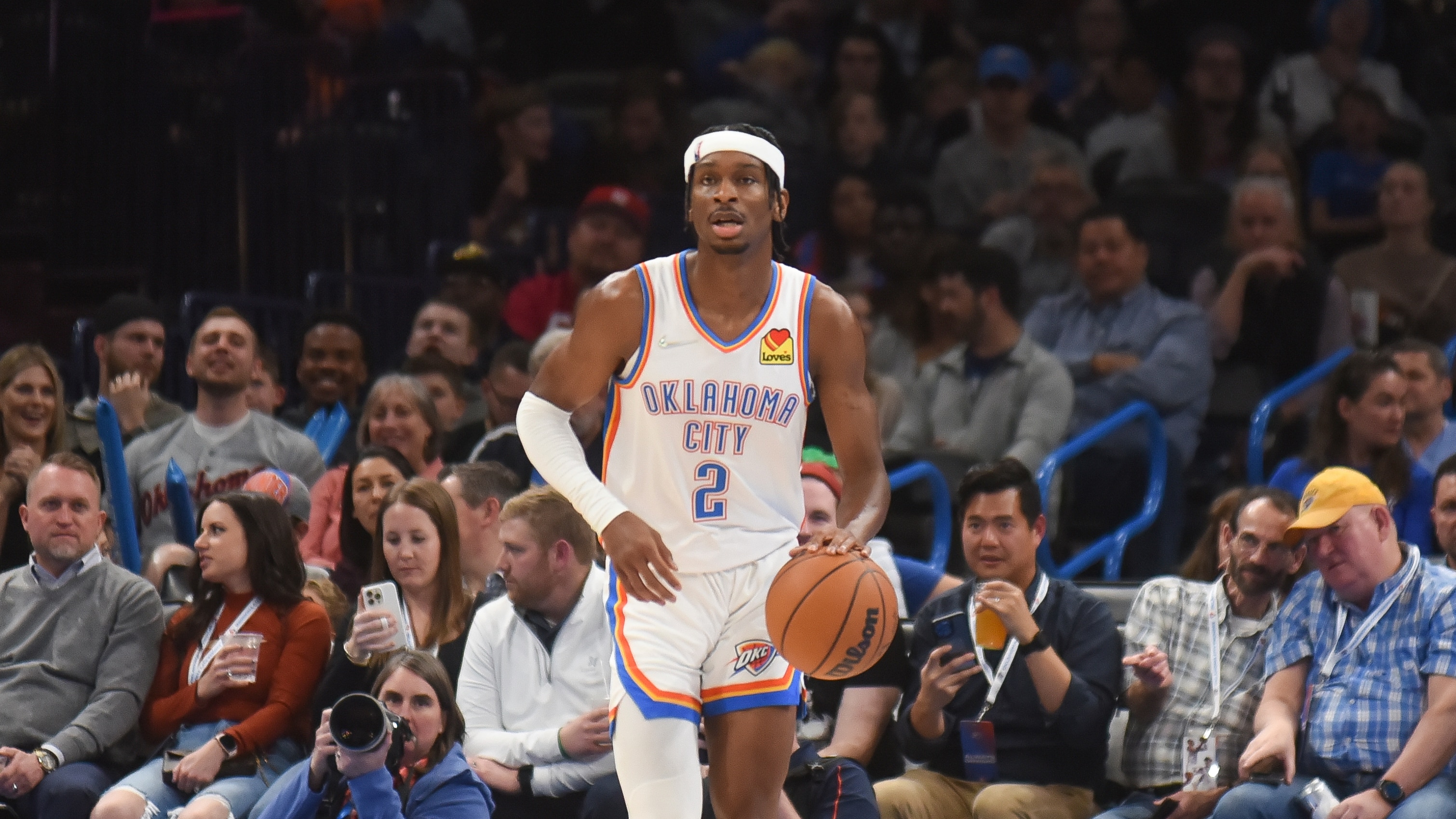 Oklahoma City Thunder guard Shai Gilgeous-Alexander pushes down the court in the second half of an NBA basketball game against Charlotte Hornets, Monday, March 14, 2022, in Oklahoma City. (AP Photo/Kyle Phillips)