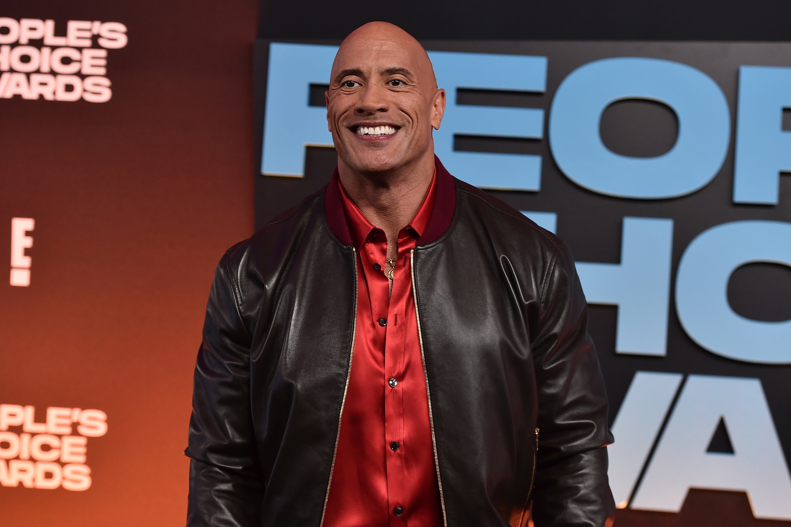 Dwayne "The Rock" Johnson arrives at the People's Choice Awards on Tuesday, Dec. 7, 2021, at the Barker Hangar in Santa Monica, Calif. (Photo by Jordan Strauss/Invision/AP) Dwayne "The Rock" Johnson arrives at the People's Choice Awards on Tuesday, Dec. 7, 2021, at the Barker Hangar in Santa Monica, Calif. (Photo by Jordan Strauss/Invision/AP)