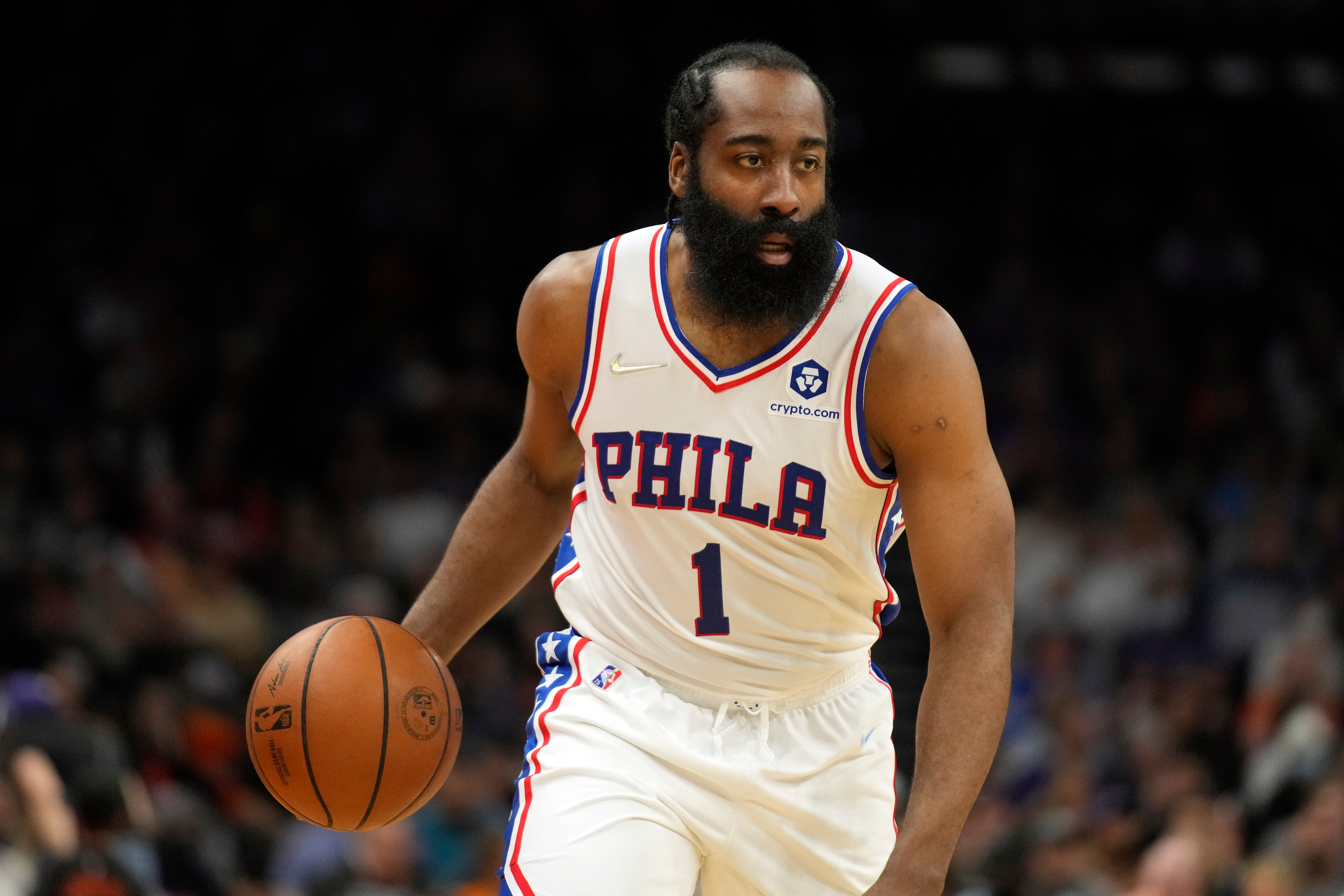 Philadelphia 76ers guard James Harden (1) during the first half of an NBA basketball game against the Phoenix Suns, Sunday, March 27, 2022, in Phoenix. (AP Photo/Rick Scuteri)