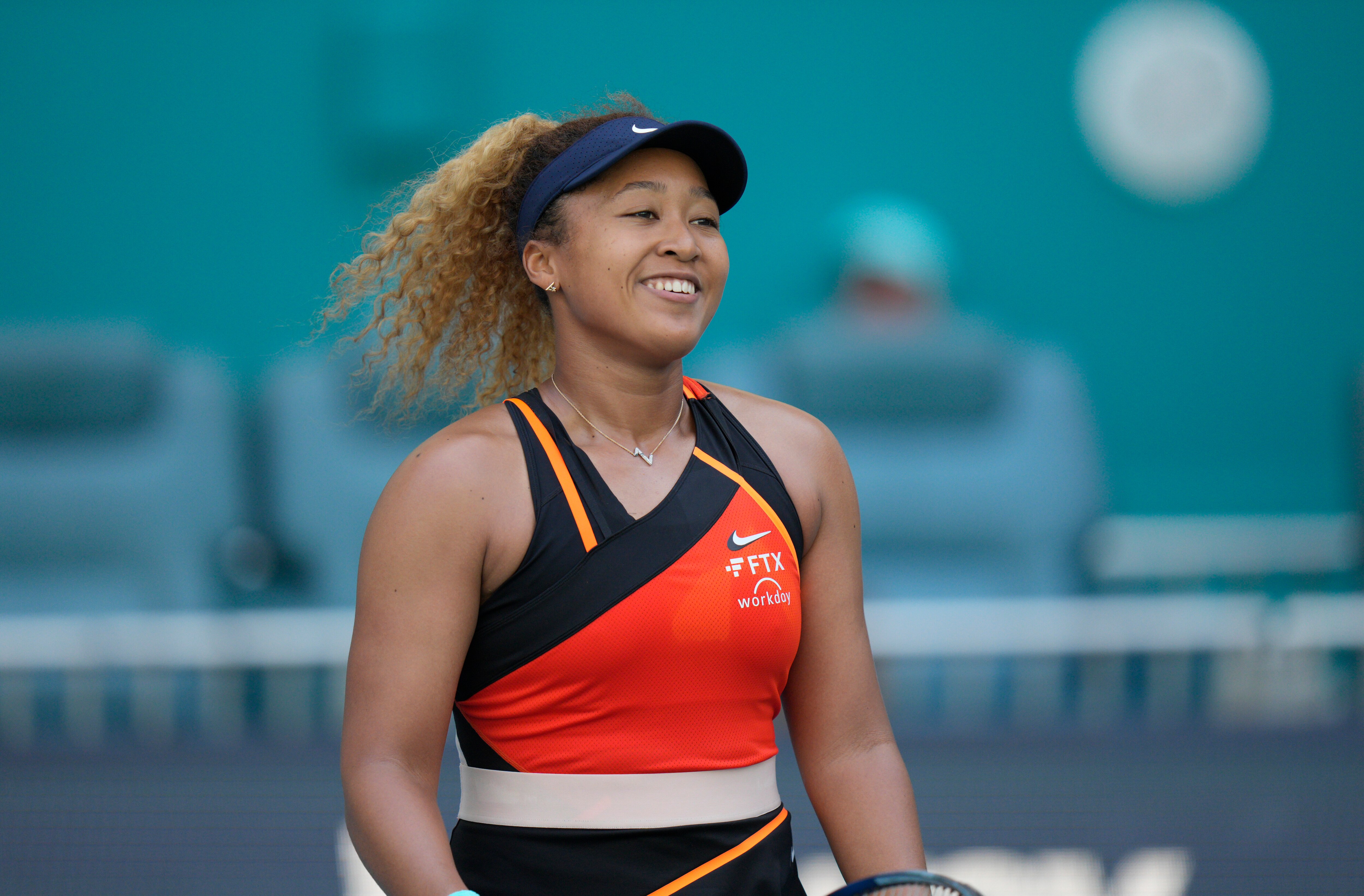 MIAMI GARDENS, FLORIDA - MARCH 28: Naomi Osaka of Japan celebrates  after defeating Alison Riske of United States during the Women’s Singles match on Day 8 of the 2022 Miami Open presented by Itaú at Hard Rock Stadium on March 28, 2022 in Miami Gardens, Florida. (Photo by Mark Brown/Getty Images)