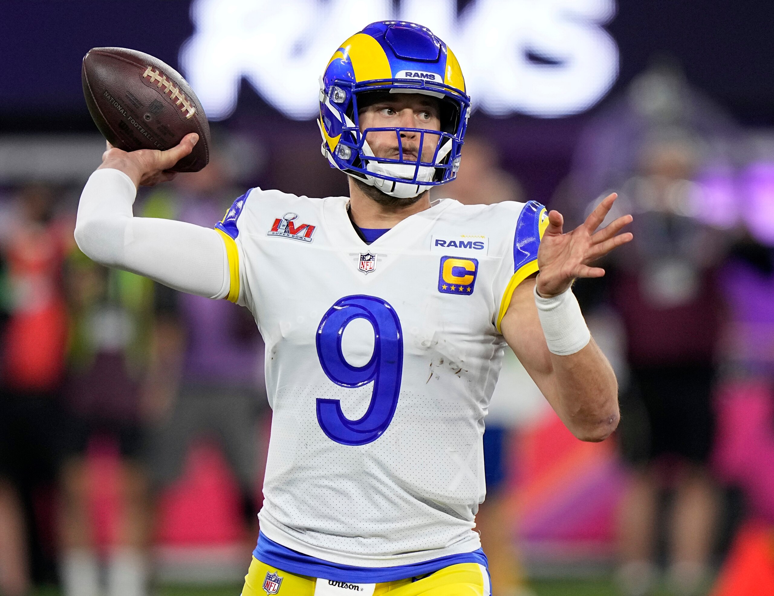 FILE - Los Angeles Rams quarterback Matthew Stafford prepares to pass against the Cincinnati Bengals during the second half of the NFL Super Bowl 56 football game Feb. 13, 2022, in Inglewood, Calif. Stafford realizes he probably could have got more money in his newest contract extension after an outstanding debut season with the Rams but his priority is not more dollars, it is more rings. (AP Photo/Lynne Sladky, File)