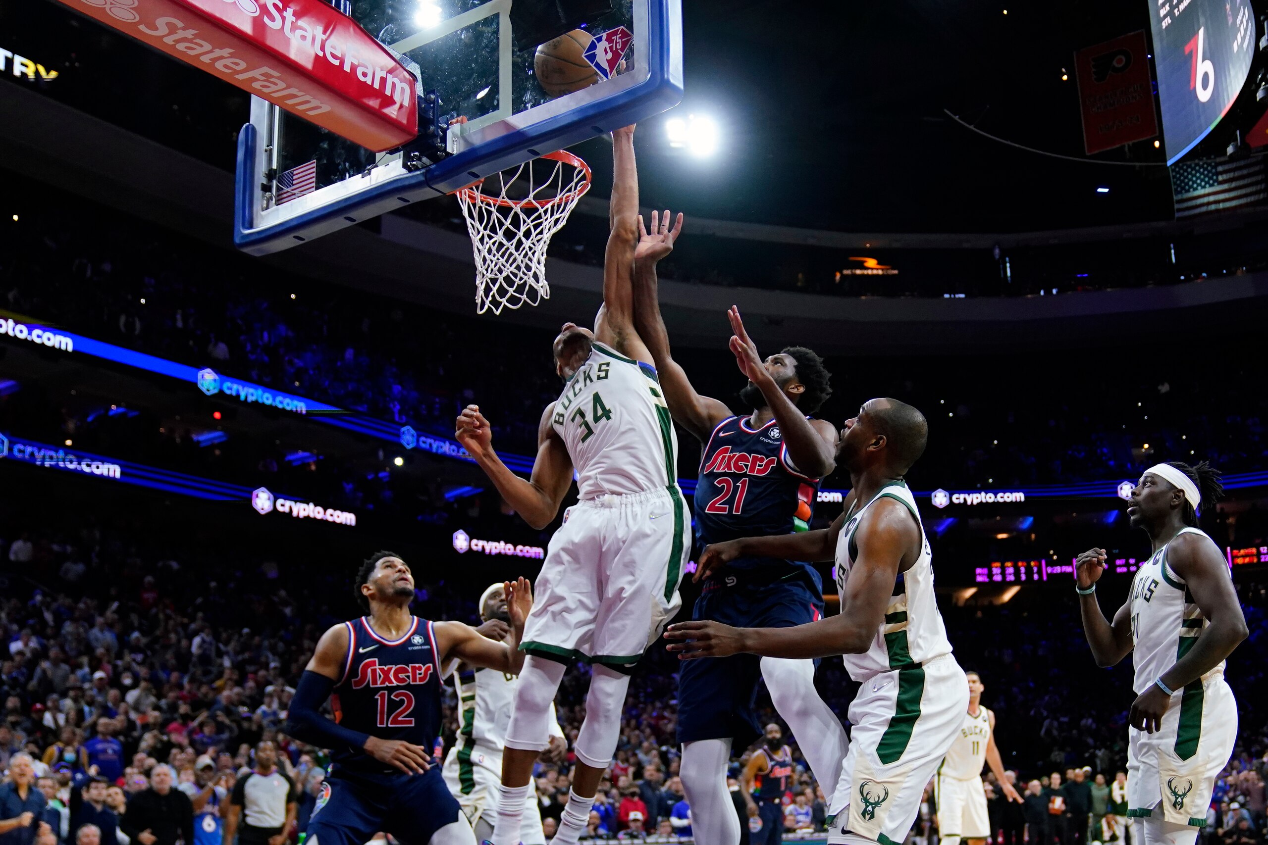 Milwaukee Bucks' Giannis Antetokounmpo (34) blocks a shot by Philadelphia 76ers' Joel Embiid (21) in the final seconds of an NBA basketball game, Tuesday, March 29, 2022, in Philadelphia. (AP Photo/Matt Slocum) Milwaukee Bucks' Giannis Antetokounmpo (34) blocks a shot by Philadelphia 76ers' Joel Embiid (21) in the final seconds of an NBA basketball game, Tuesday, March 29, 2022, in Philadelphia. (AP Photo/Matt Slocum)