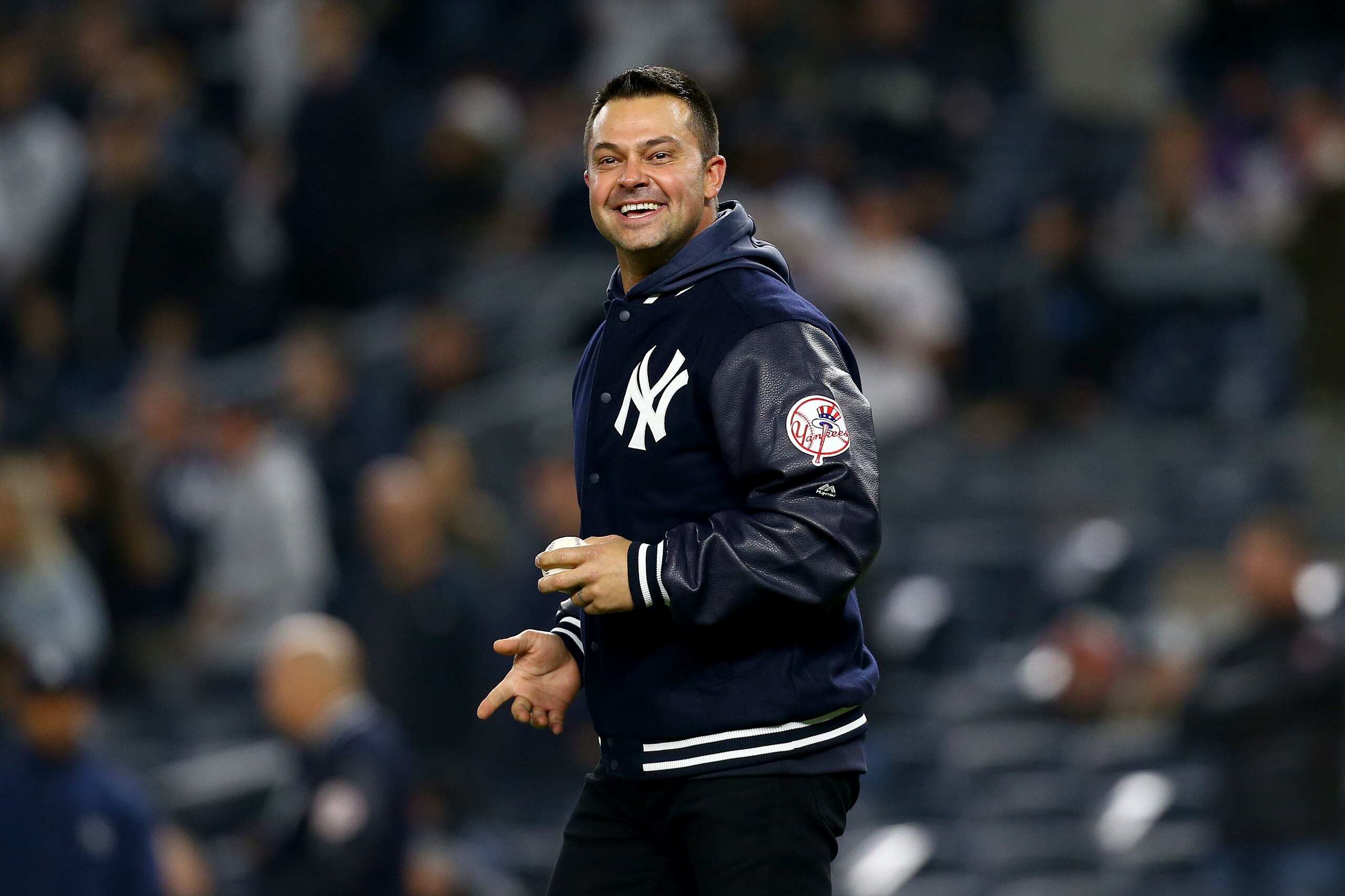 NEW YORK, NEW YORK - OCTOBER 18: Former New York Yankees player Nick Swisher prepares to throw out the first pitch prior to game five of the American League Championship Series against the Houston Astros at Yankee Stadium on October 18, 2019 in New York City. (Photo by Mike Stobe/Getty Images) NEW YORK, NEW YORK - OCTOBER 18: Former New York Yankees player Nick Swisher prepares to throw out the first pitch prior to game five of the American League Championship Series against the Houston Astros at Yankee Stadium on October 18, 2019 in New York City. (Photo by Mike Stobe/Getty Images)