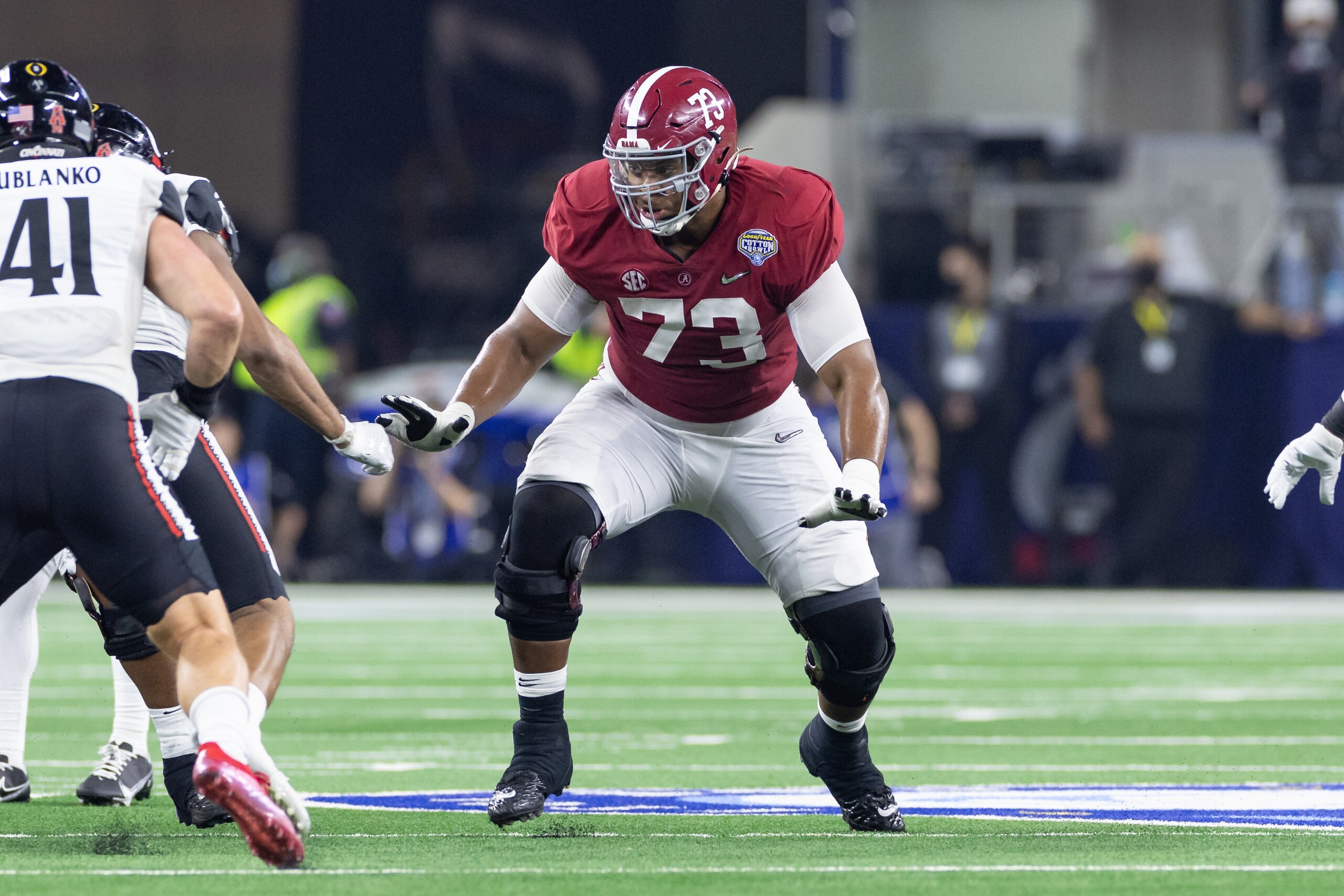 ARLINGTON, TX - DECEMBER 31: Alabama Crimson Tide offensive tackle Evan Neal (#73) blocks during the Goodyear Cotton Bowl CFP Semifinal college football game between the Alabama Crimson Tide and the Cincinnati Bearcats on December 31, 2021 at AT&T Stadium in Arlington, Texas.  (Photo by Matthew Visinsky/Icon Sportswire via Getty Images)