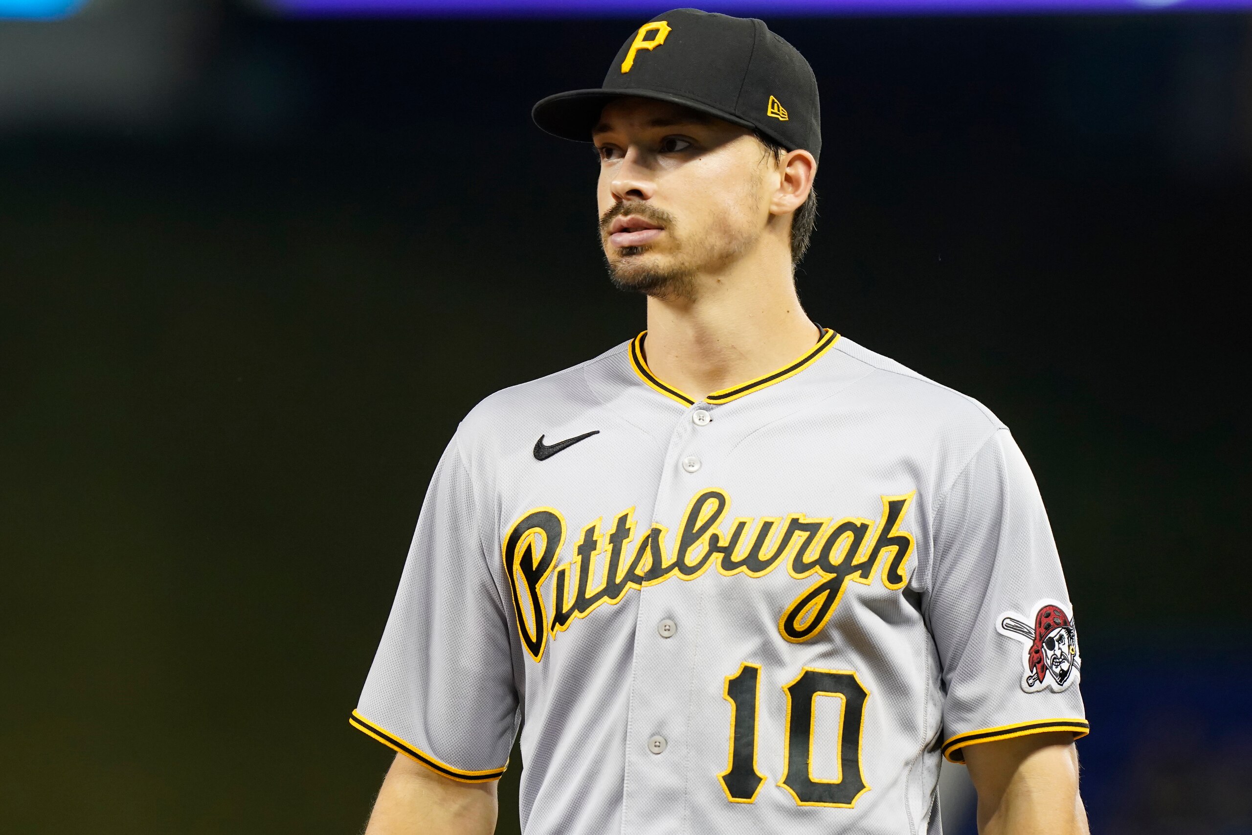 Pittsburgh Pirates left fielder Bryan Reynolds (10) walks back to the dugout during a baseball game against the Miami Marlins, Saturday, Sept. 18, 2021, in Miami. (AP Photo/Marta Lavandier)