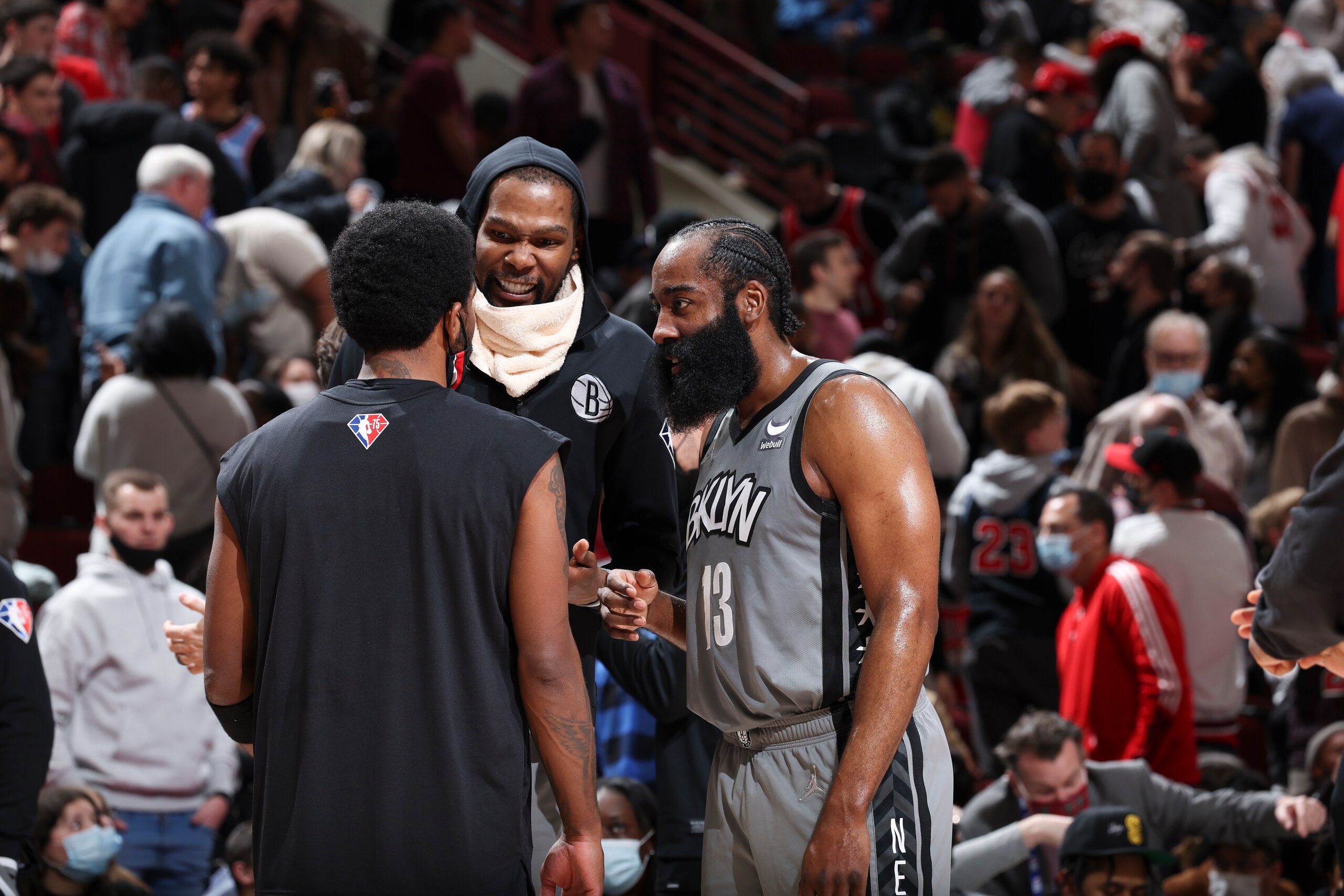 CHICAGO, IL - JANUARY 12: Kyrie Irving #11 of the Brooklyn Nets talks to Kevin Durant #7 of the Brooklyn Nets and James Harden #13 of the Brooklyn Nets during the game against the Chicago Bulls on January 12, 2022 at United Center in Chicago, Illinois. NOTE TO USER: User expressly acknowledges and agrees that, by downloading and or using this photograph, User is consenting to the terms and conditions of the Getty Images License Agreement. Mandatory Copyright Notice: Copyright 2022 NBAE (Photo by Jeff Haynes/NBAE via Getty Images)