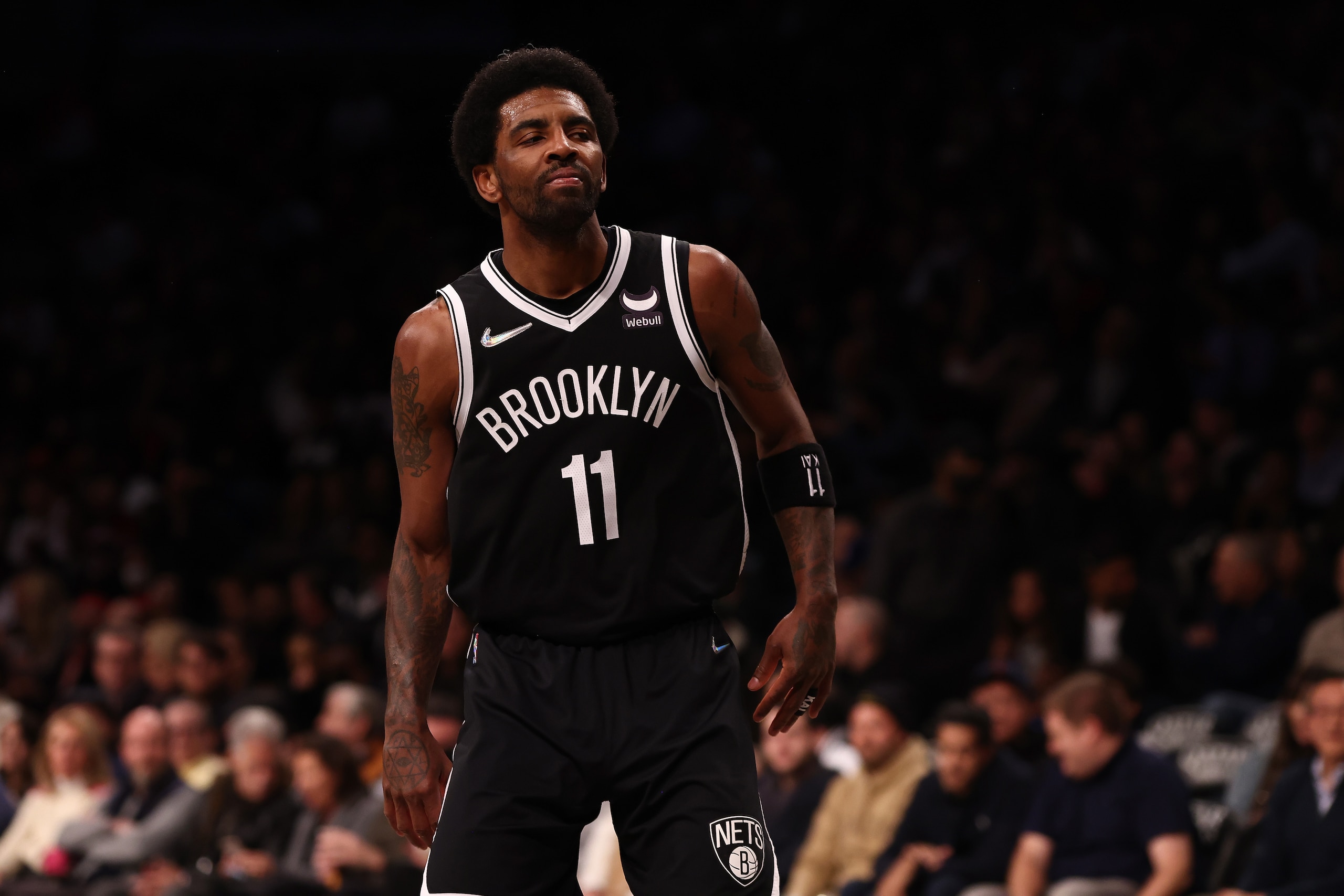 NEW YORK, NEW YORK - MARCH 29: Kyrie Irving #11 of the Brooklyn Nets in action against the Detroit Pistons at Barclays Center on March 29, 2022 in New York City. NOTE TO USER: User expressly acknowledges and agrees that, by downloading and or using this photograph, User is consenting to the terms and conditions of the Getty Images License Agreement. Brooklyn Nets defeated the Detroit Pistons 130-123. (Photo by Mike Stobe/Getty Images)