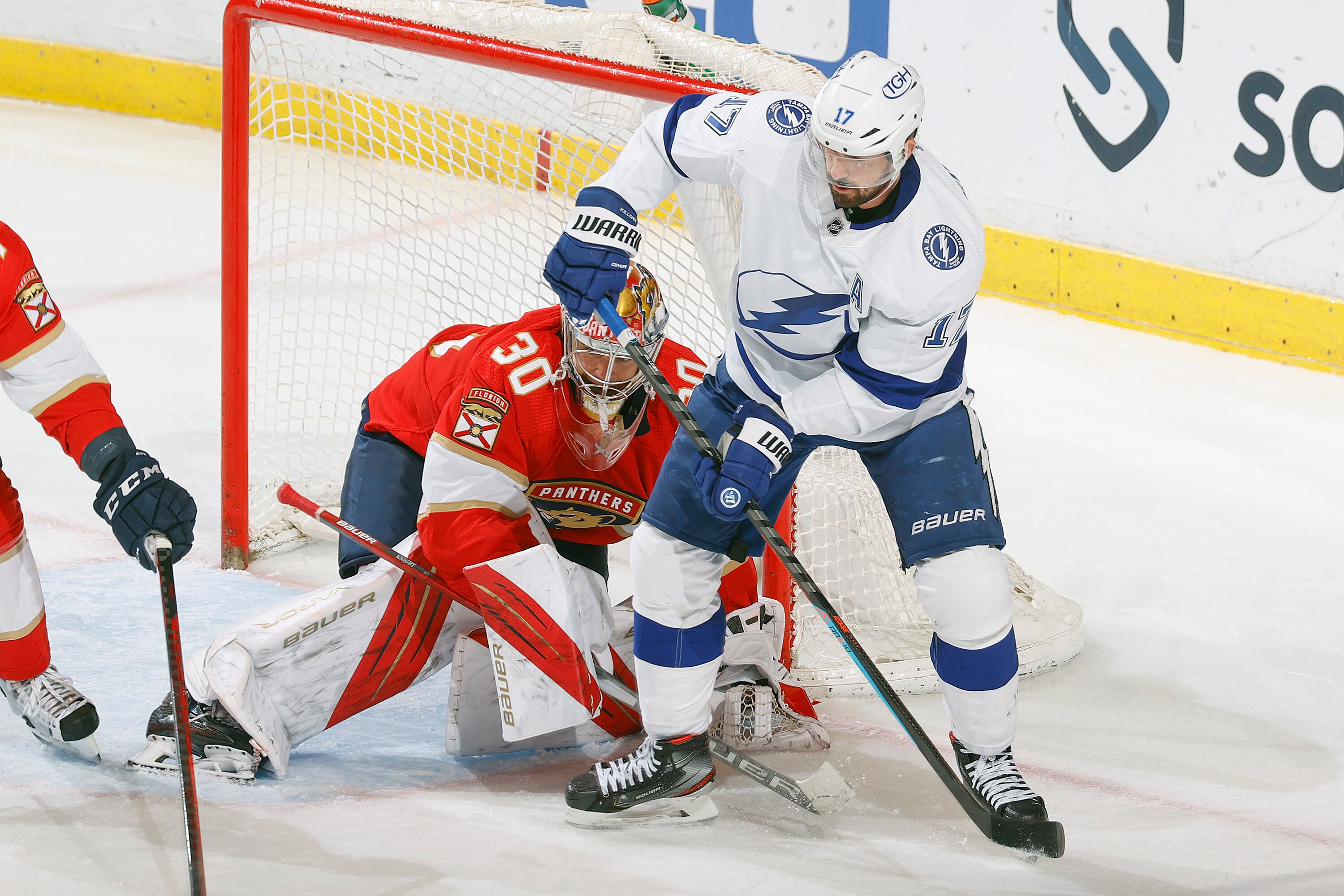 SUNRISE, FL - DECEMBER 30: Alex Killorn #17 of the Tampa Bay Lightning gets into position next to Goaltender Spencer Knight #30 of the Florida Panthers during third period action at the FLA Live Arena on December 30, 2021 in Sunrise, Florida. (Photo by Joel Auerbach/NHLI via Getty Images)