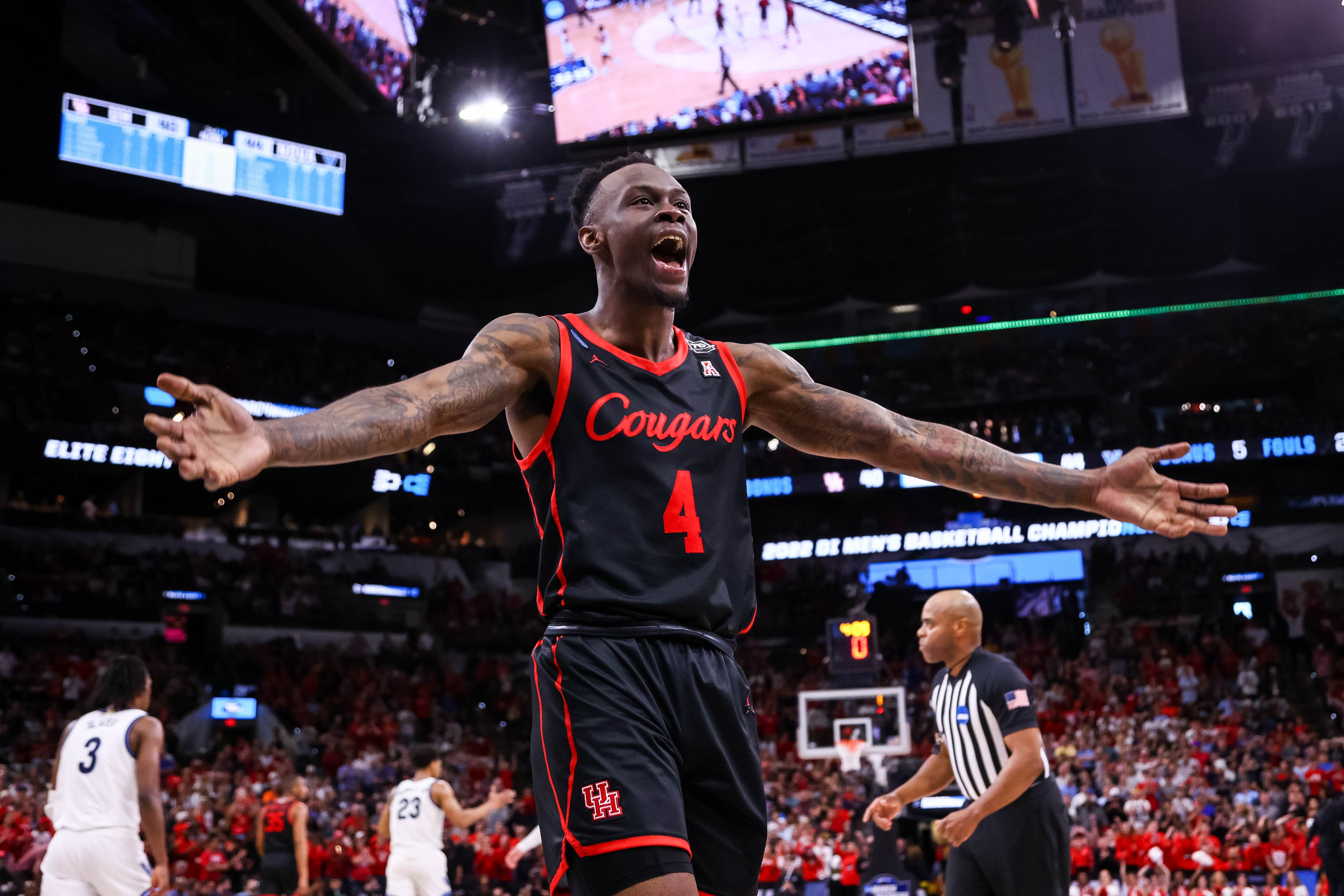 SAN ANTONIO, TX - MARCH 26: Taze Moore #4 of the Houston Cougars reacts during the game against the Villanova Wildcats during the Elite Eight round of the 2022 NCAA Mens Basketball Tournament held at AT&T Center on March 26, 2022 in San Antonio, Texas. (Photo by C. Morgan Engel/NCAA Photos via Getty Images)