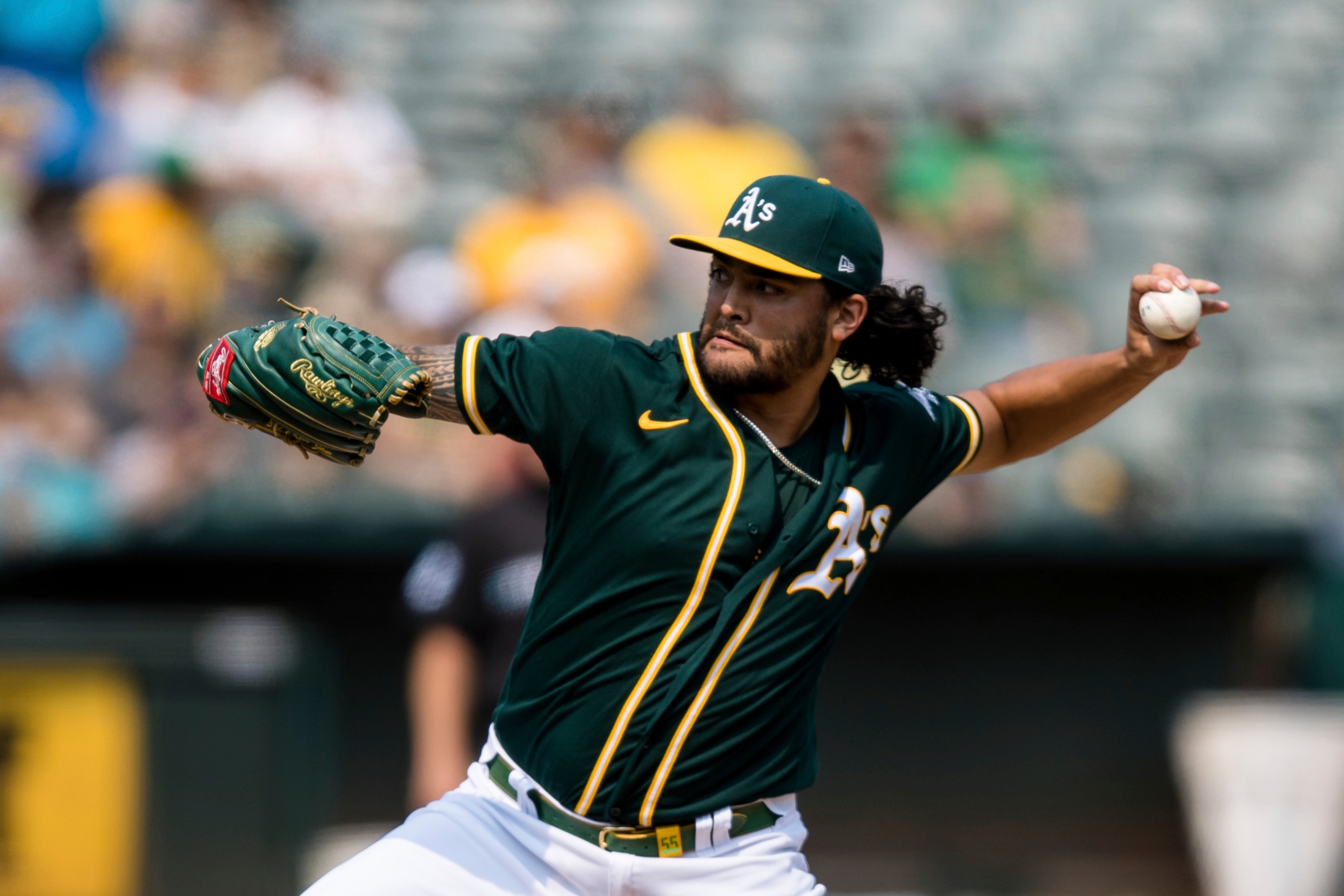 Oakland Athletics starting pitcher Sean Manaea works against the Houston Astros in the first inning of a baseball game in Oakland, Calif., Saturday, Sept. 25, 2021. (AP Photo/John Hefti)