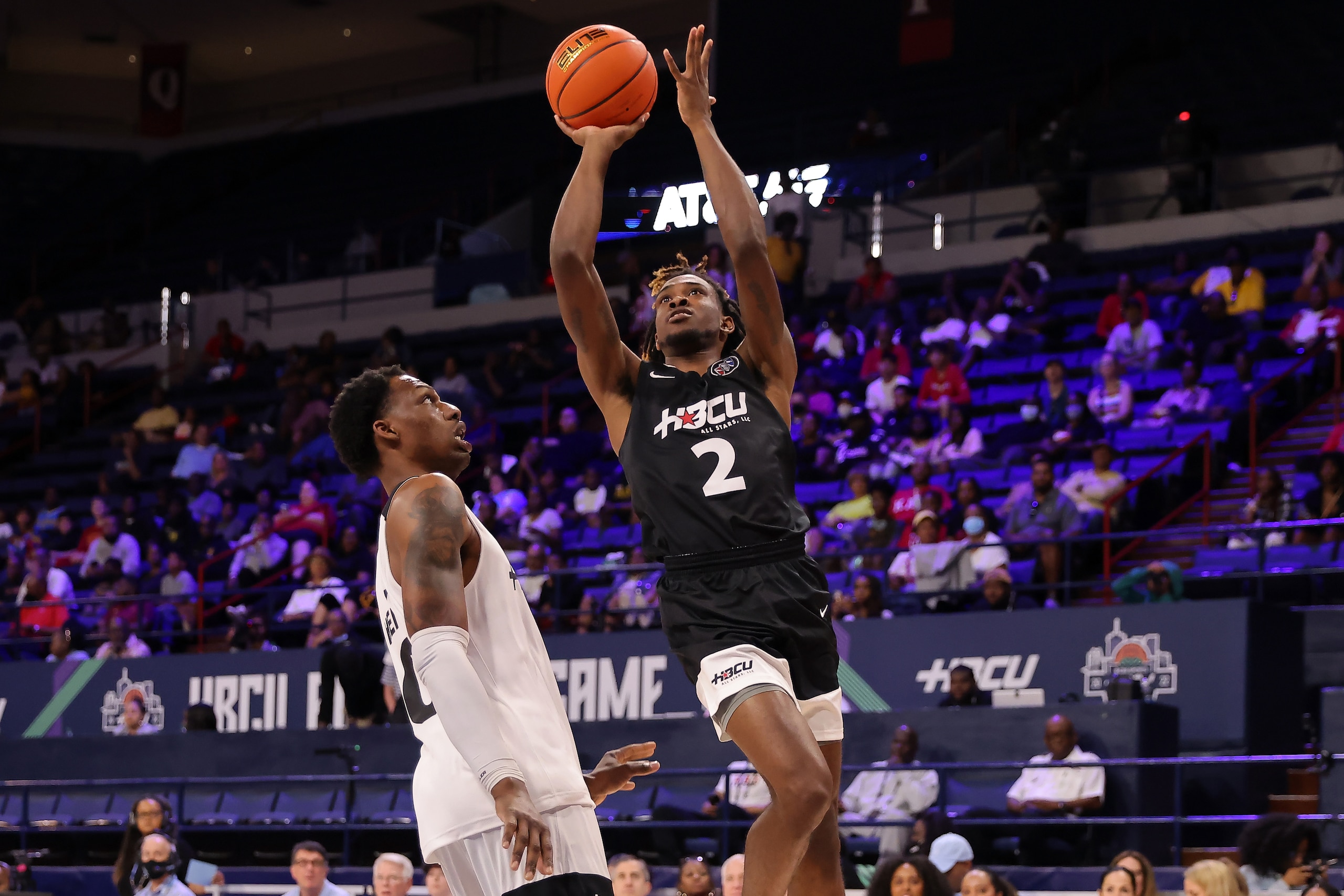 NEW ORLEANS, LOUISIANA - APRIL 03: Trey Deloach #2 of the John McLendon team shoots against Lenell Henry #0 of the of the Clarence Gains team during the first half at the UNO Lakefront Arena on April 03, 2022 in New Orleans, Louisiana. (Photo by Jonathan Bachman/Getty Images) NEW ORLEANS, LOUISIANA - APRIL 03: Trey Deloach #2 of the John McLendon team shoots against Lenell Henry #0 of the of the Clarence Gains team during the first half at the UNO Lakefront Arena on April 03, 2022 in New Orleans, Louisiana. (Photo by Jonathan Bachman/Getty Images)