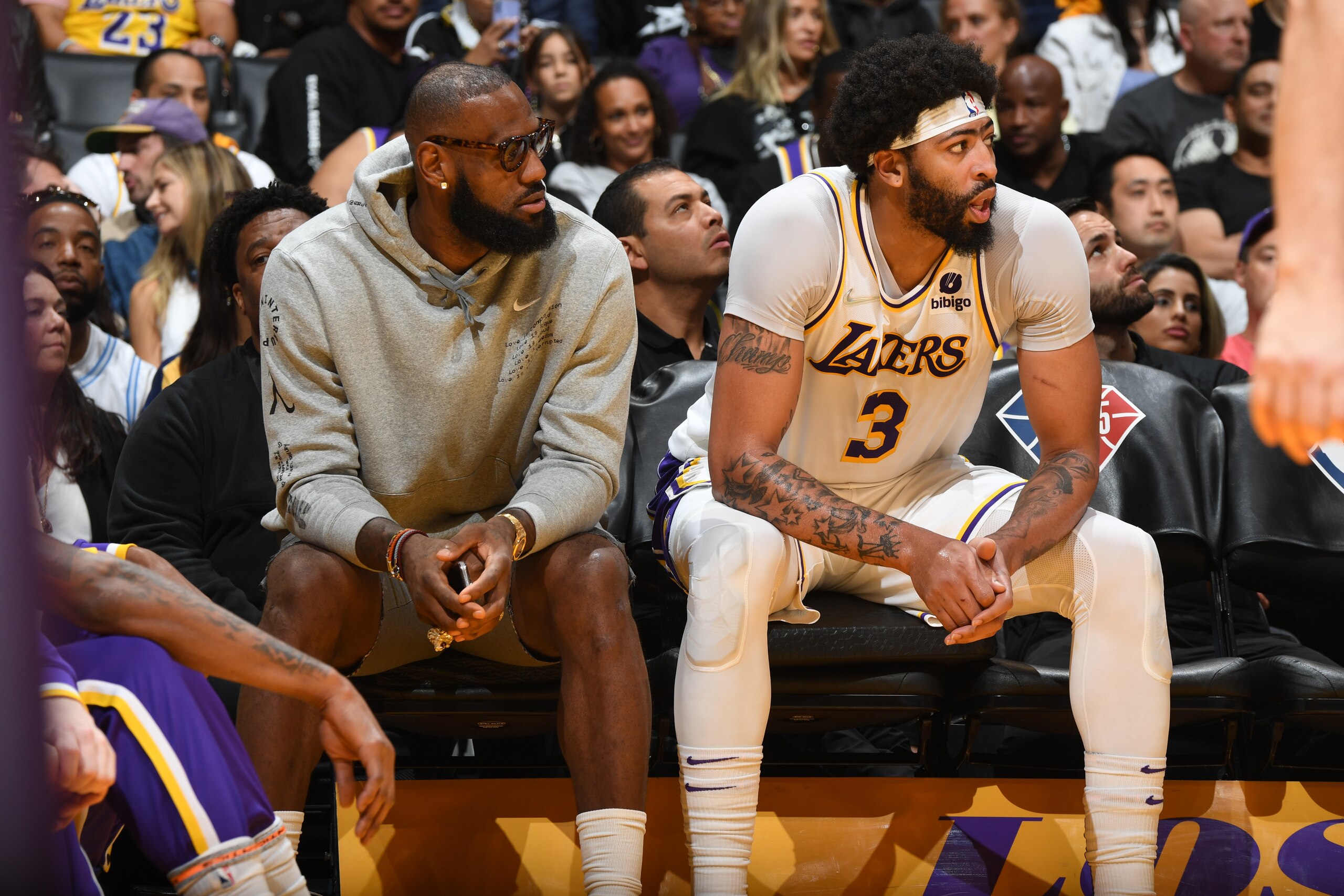 LOS ANGELES, CA - APRIL 3: LeBron James #6 of the Los Angeles Lakers and Anthony Davis #3 of the Los Angeles Lakers look on during the game against the Denver Nuggets on April 3, 2022 at Crypto.Com Arena in Los Angeles, California. NOTE TO USER: User expressly acknowledges and agrees that, by downloading and/or using this Photograph, user is consenting to the terms and conditions of the Getty Images License Agreement. Mandatory Copyright Notice: Copyright 2022 NBAE (Photo by Andrew D. Bernstein/NBAE via Getty Images)