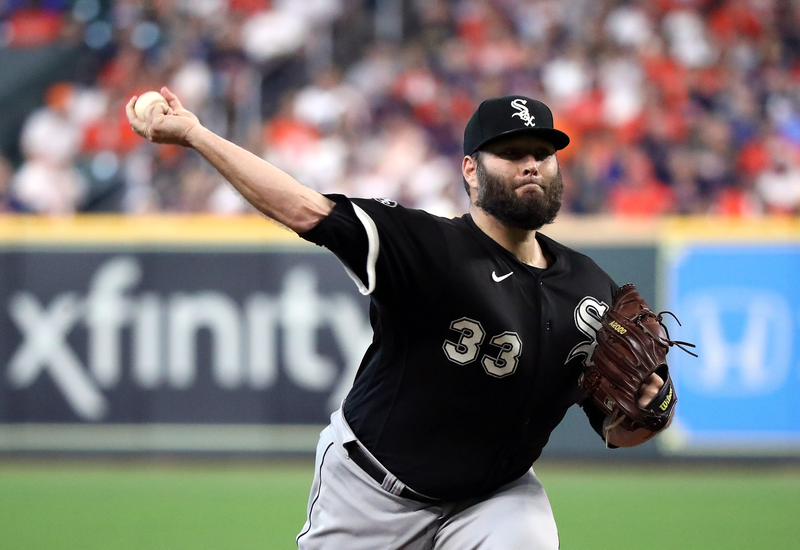 HOUSTON, TEXAS - OCTOBER 07: Starting pitcher Lance Lynn #33 of the Chicago White Sox pitches during the 1st inning of Game 1 of the American League Division Series against the Houston Astros at Minute Maid Park on October 07, 2021 in Houston, Texas. (Photo by Bob Levey/Getty Images) HOUSTON, TEXAS - OCTOBER 07: Starting pitcher Lance Lynn #33 of the Chicago White Sox pitches during the 1st inning of Game 1 of the American League Division Series against the Houston Astros at Minute Maid Park on October 07, 2021 in Houston, Texas. (Photo by Bob Levey/Getty Images)