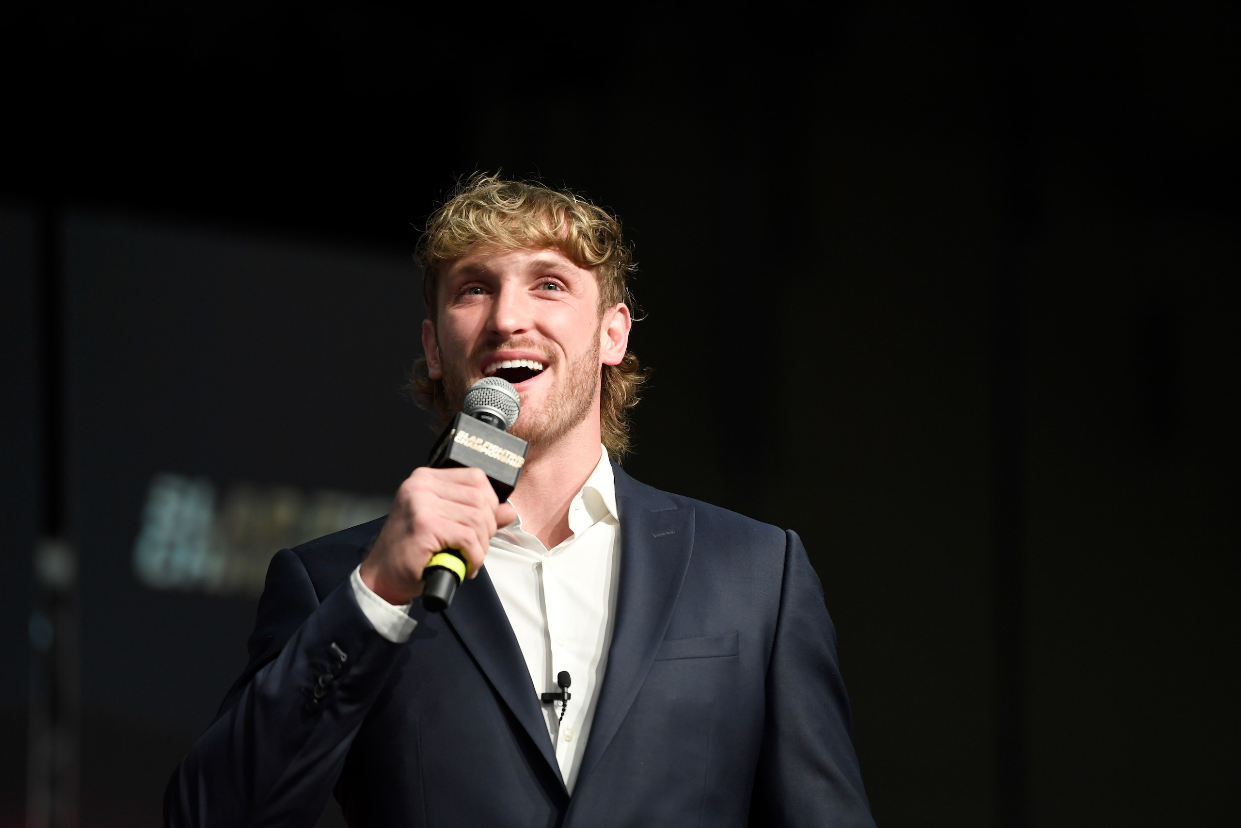 COLUMBUS, OHIO - MARCH 05:  Logan Pau speaks to fans during the Slap Fighting Championships at the Arnold Sports Festival in Columbus Convention Center on March 05, 2022 in Columbus, Ohio. (Photo by Gaelen Morse/Getty Images)