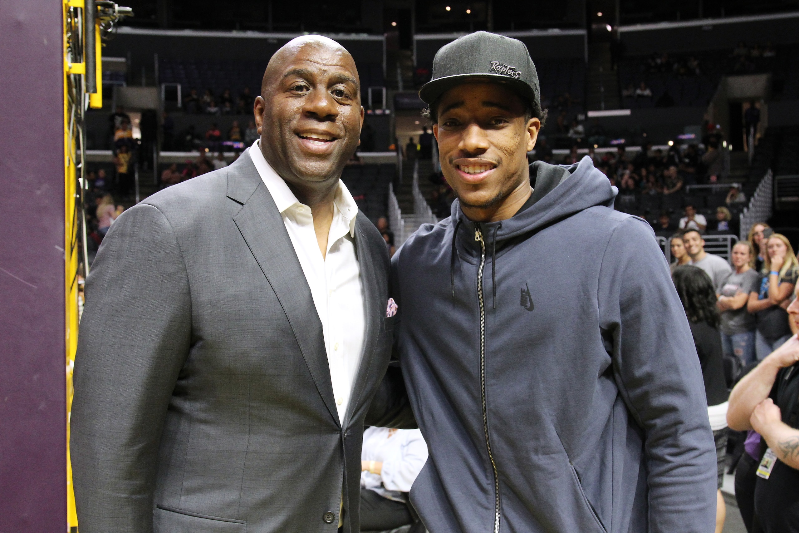 LOS ANGELES, CA - MAY 19:  Los Angeles Sparks owner Ervin Magic Johnson and DeMar DeRozan of the Toronto Raptors attend Washington Wizards vs the Los Angeles Sparks during a WNBA basketball at Staples Center on May 19, 2017 in Los Angeles, California.  (Photo by Leon Bennett/Getty Images)