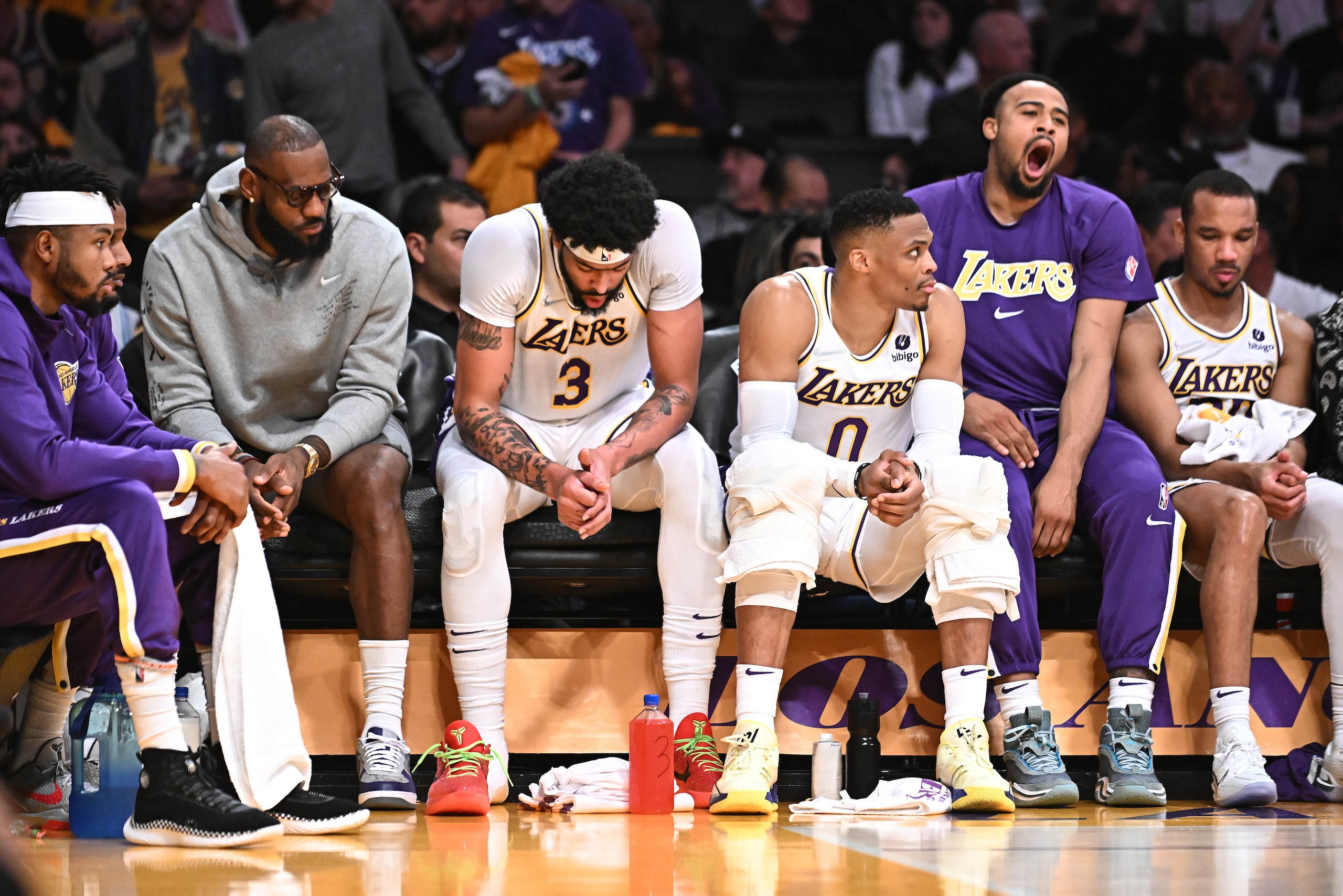 Los Angeles, California April 3, 2022- Lakers players including from left, LeBron James, Anthony Davis and Russell Westbrook sit with teammates on the bench late in the game against the Nuggets at Crypto.com Arena Sunday. (Wally Skalij/Los Angeles Times via Getty Images) Los Angeles, California April 3, 2022- Lakers players including from left, LeBron James, Anthony Davis and Russell Westbrook sit with teammates on the bench late in the game against the Nuggets at Crypto.com Arena Sunday. (Wally Skalij/Los Angeles Times via Getty Images)