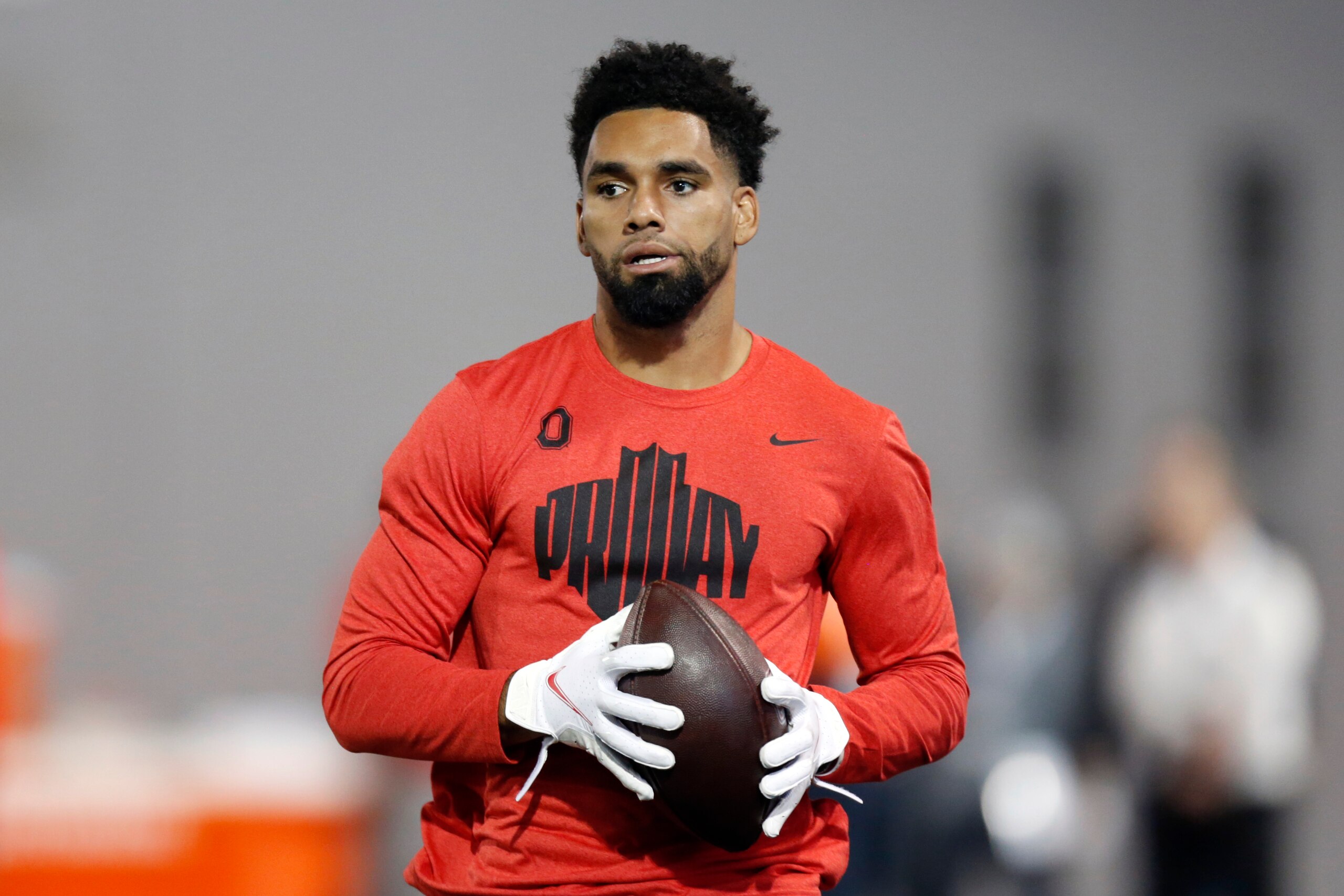 Wide receiver Chris Olave runs a football drill during Ohio State Pro Day in Columbus, Ohio, Wednesday, March 23, 2022. (AP Photo/Paul Vernon)