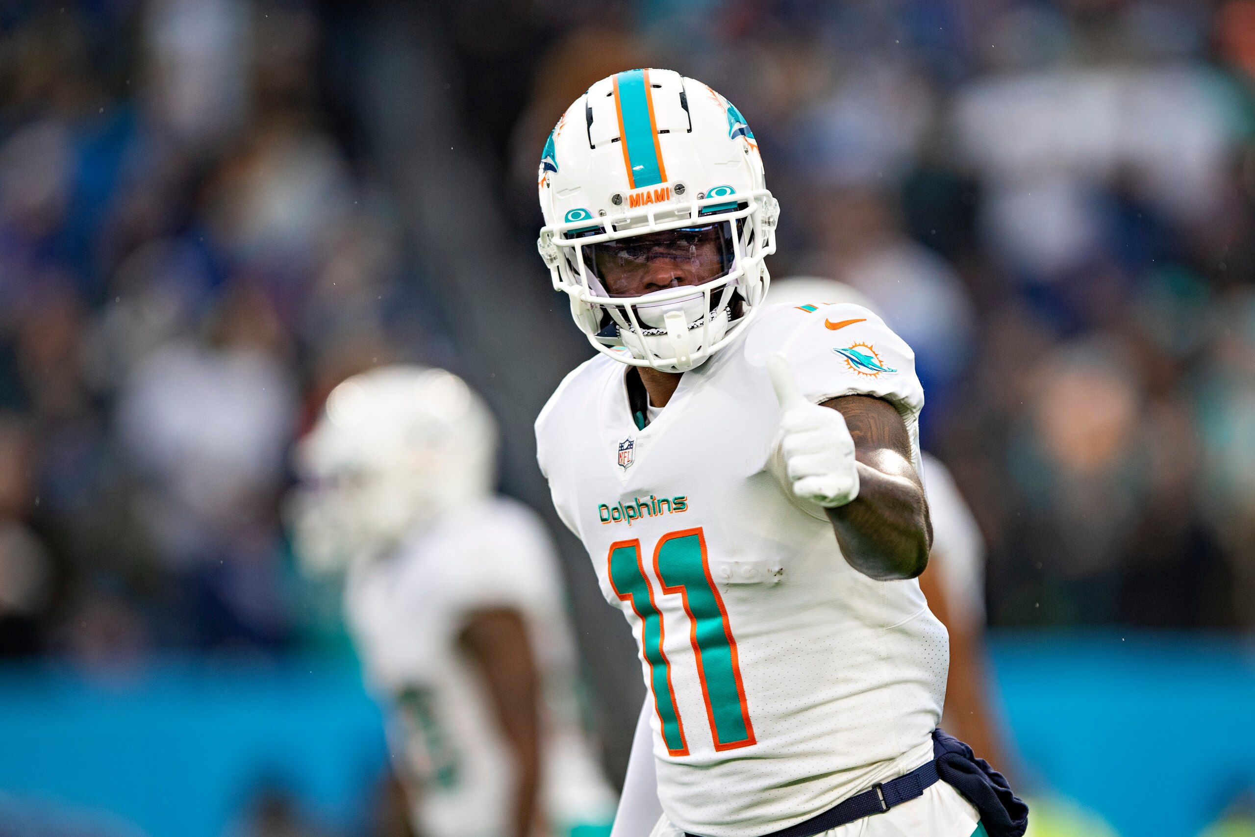 NASHVILLE, TENNESSEE - JANUARY 2:  DeVante Parker #11 of the Miami Dolphins signals as a wide out during a game against the Tennessee Titans at Nissan Stadium on January 2, 2022 in Nashville, Tennessee.  The Titans defeated the Dolphins 34-3.  (Photo by Wesley Hitt/Getty Images)