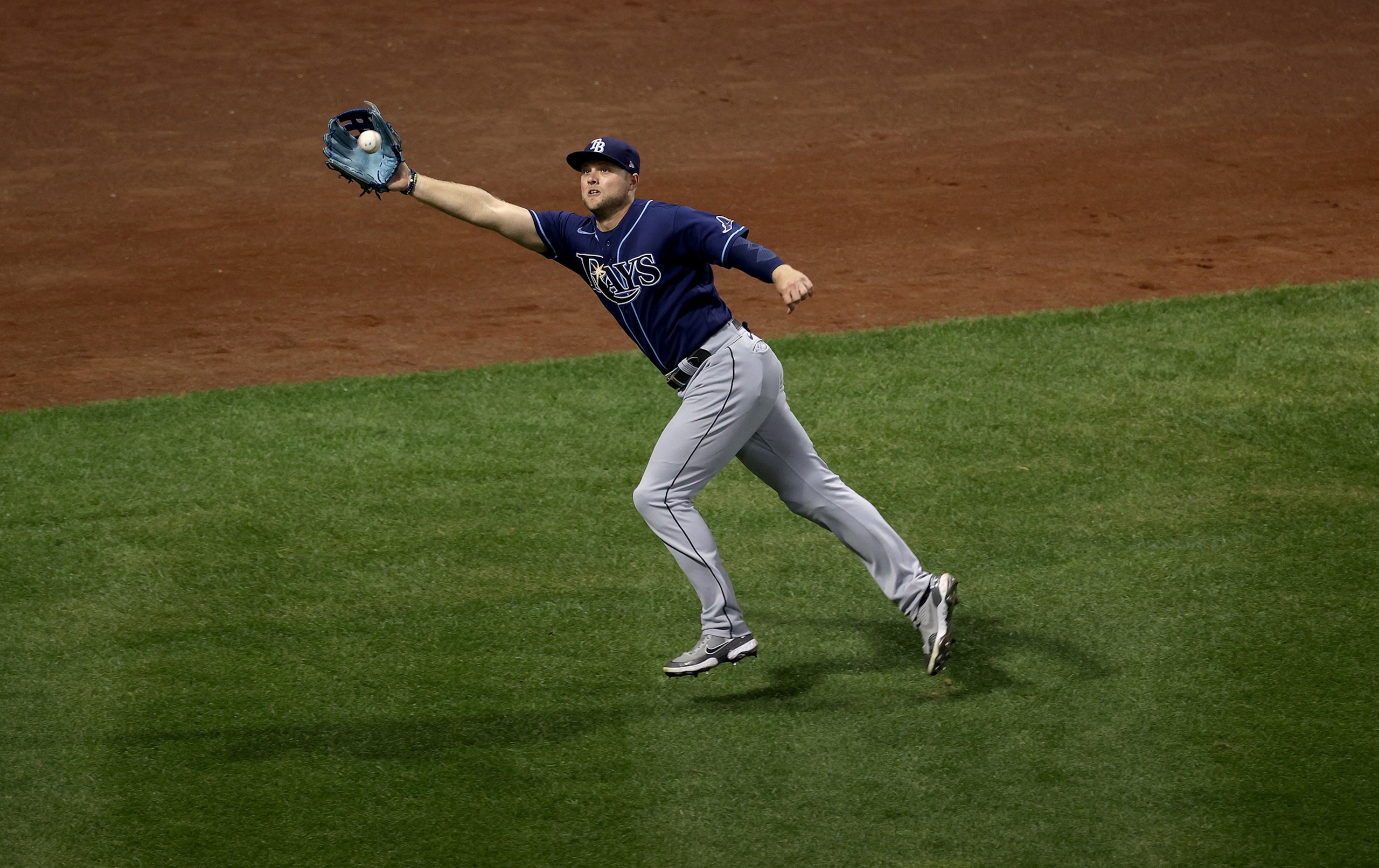 Boston - October 10: Rays Austin Meadows caught Xander Bogaerts fly ball  in the seventh inning. The Boston Red Sox host the Tampa Bay Rays in Game 3 of the ALDS at Fenway Park in Boston on Oct. 10, 2021. (Photo by Stan Grossfeld/The Boston Globe via Getty Images)