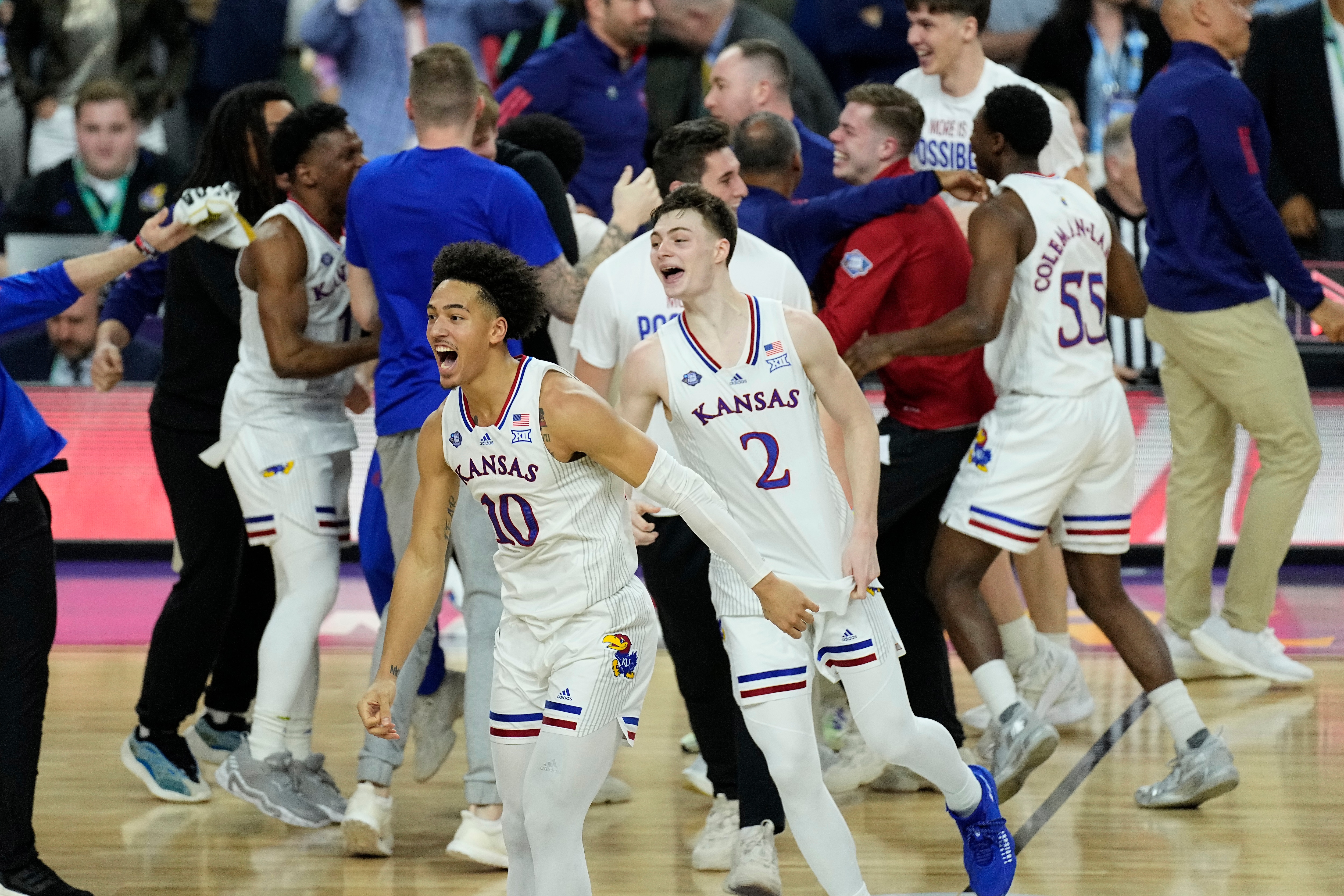 Kansas players celebrate after a college basketball game against North Carolina in the finals of the Men's Final Four NCAA tournament, Monday, April 4, 2022, in New Orleans. (AP Photo/Gerald Herbert)