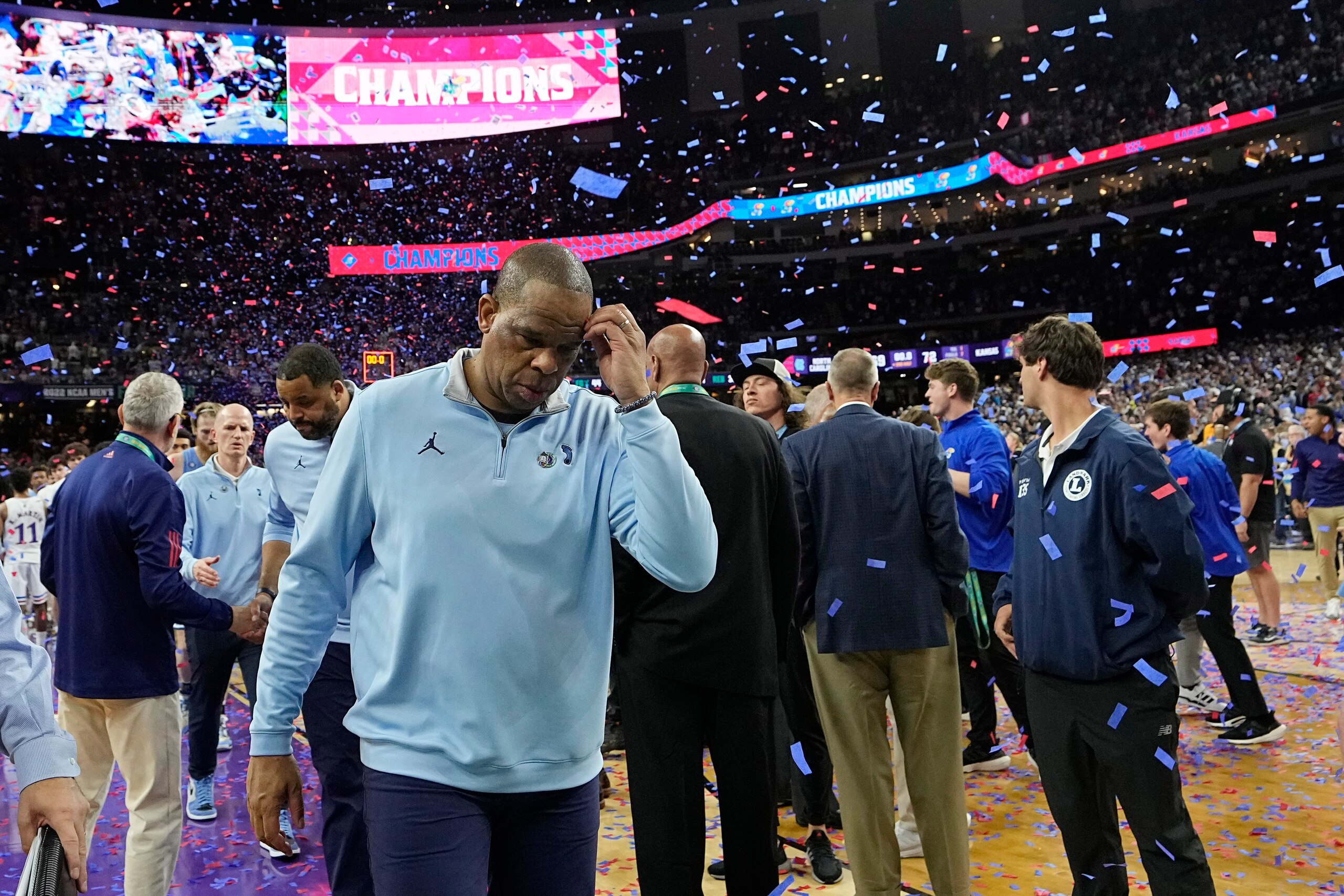 North Carolina head coach Hubert Davis walks off the court after their loss against Kansas in a college basketball game at the finals of the Men's Final Four NCAA tournament, Monday, April 4, 2022, in New Orleans. (AP Photo/David J. Phillip)