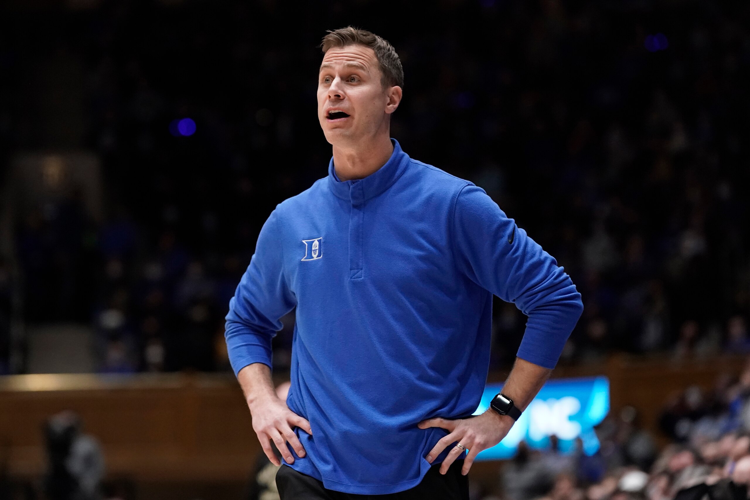 Duke associate head coach Jon Scheyer ditrects the team during the second half of an NCAA college basketball game against Wake Forest in Durham, N.C., Tuesday, Feb. 15, 2022. (AP Photo/Gerry Broome)
