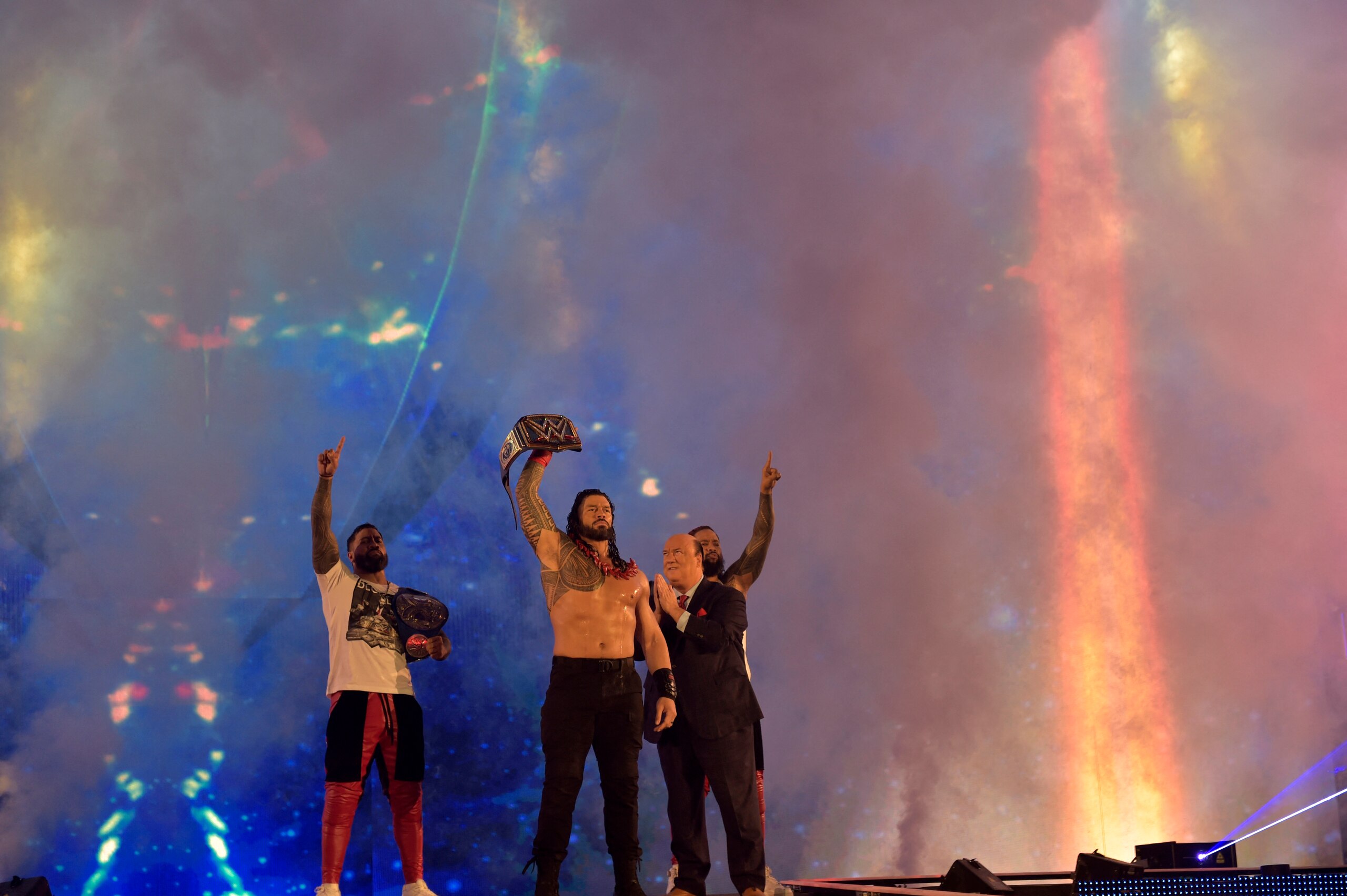 Roman Reigns wins a match during the 2022 WWE Elimination Chamber at the Jeddah Super Dome in Saudi Arabia's Red Sea coastal city of Jeddah on February 19, 2022. (Photo by Amer HILABI / AFP) (Photo by AMER HILABI/AFP via Getty Images)