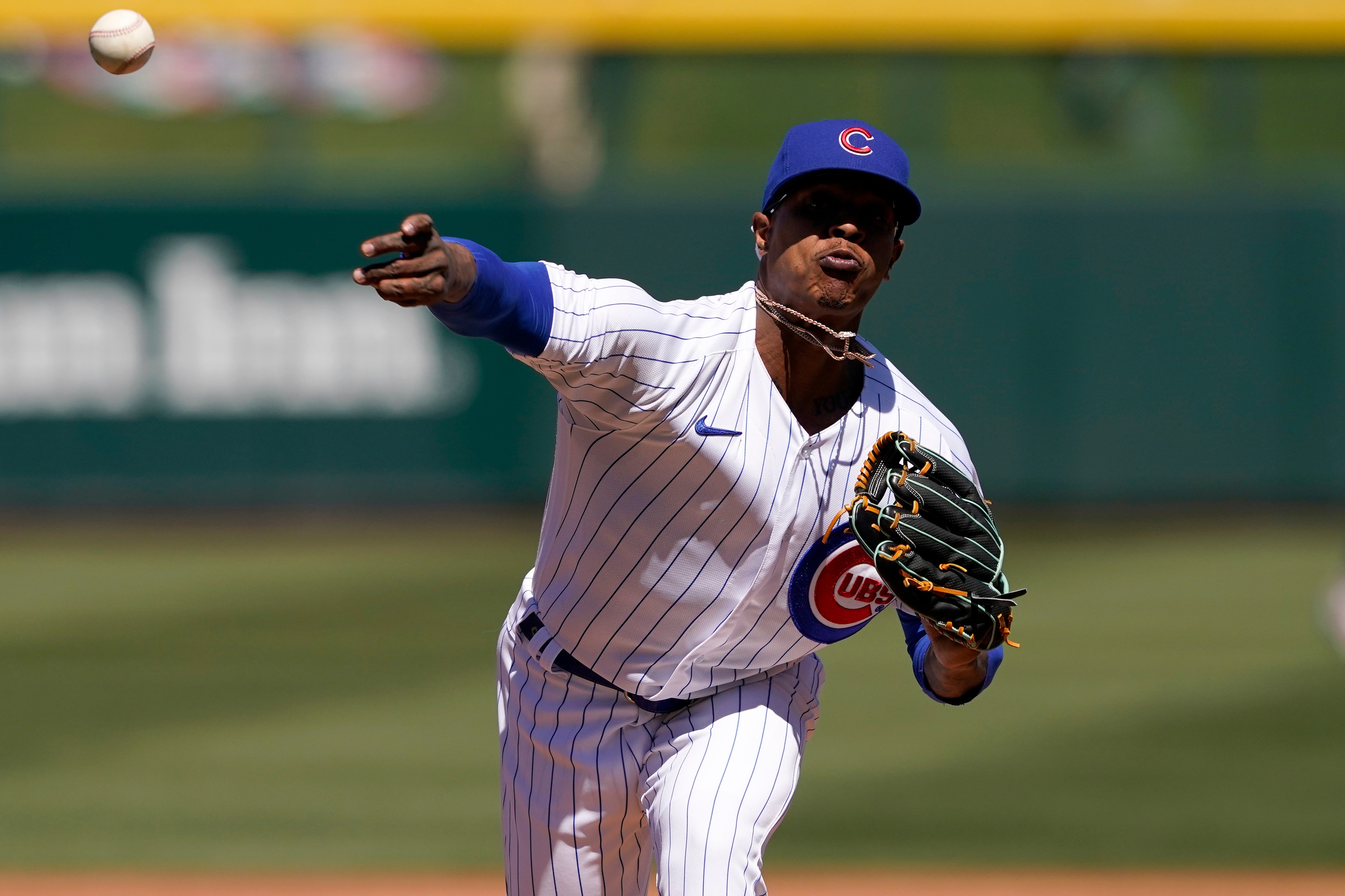 Chicago Cubs starting pitcher Marcus Stroman warms up during the first inning of a spring training baseball game against the Oakland Athletics, Wednesday, March 23, 2022, in Mesa, Ariz. (AP Photo/Matt York)