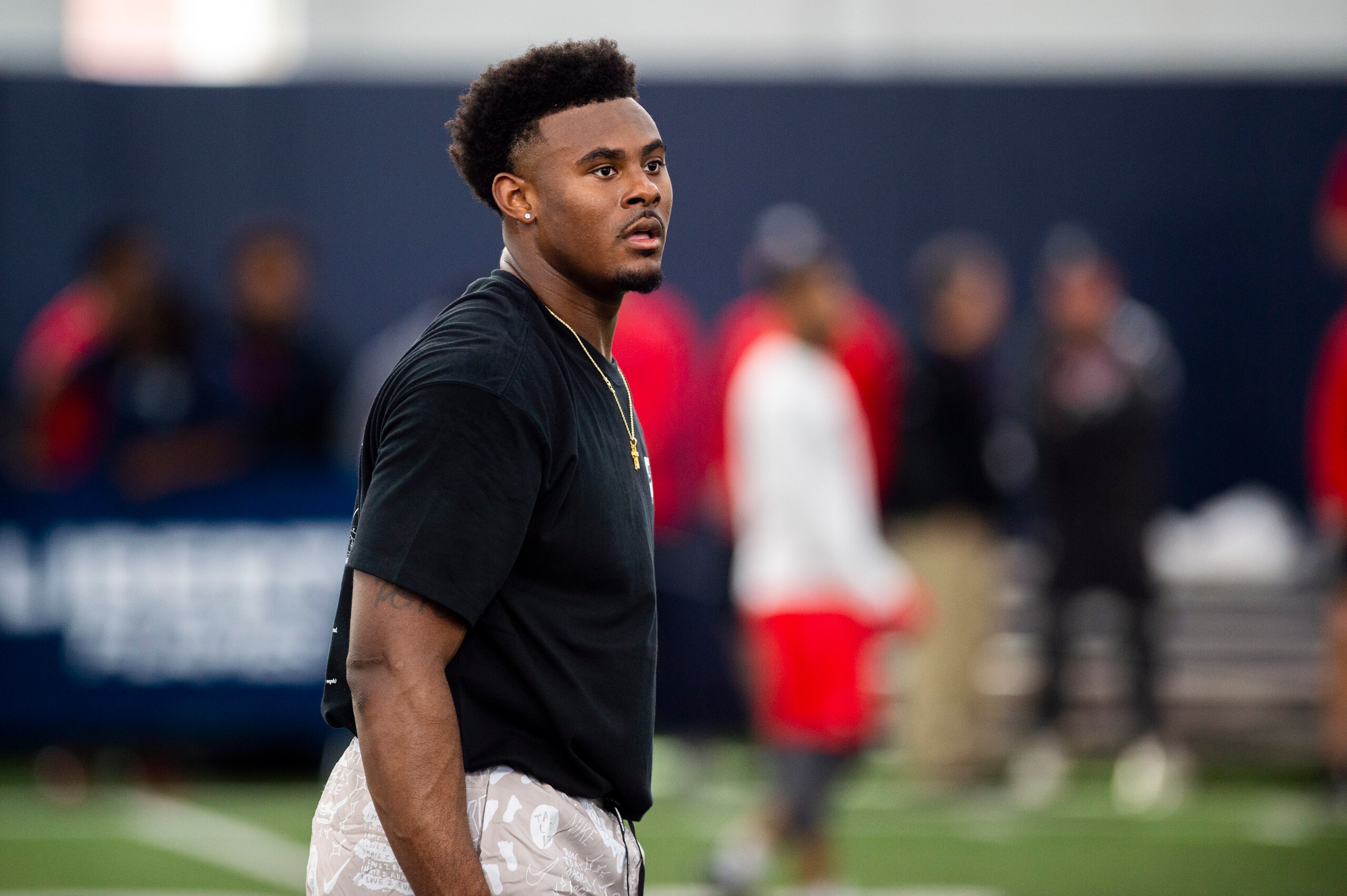 Liberty quarterback Malik Willis stands in between passing drills during Liberty Football Pro Day in Lynchburg, Va., on Tuesday, March 22, 2022. (AP Photo/Kendall Warner)