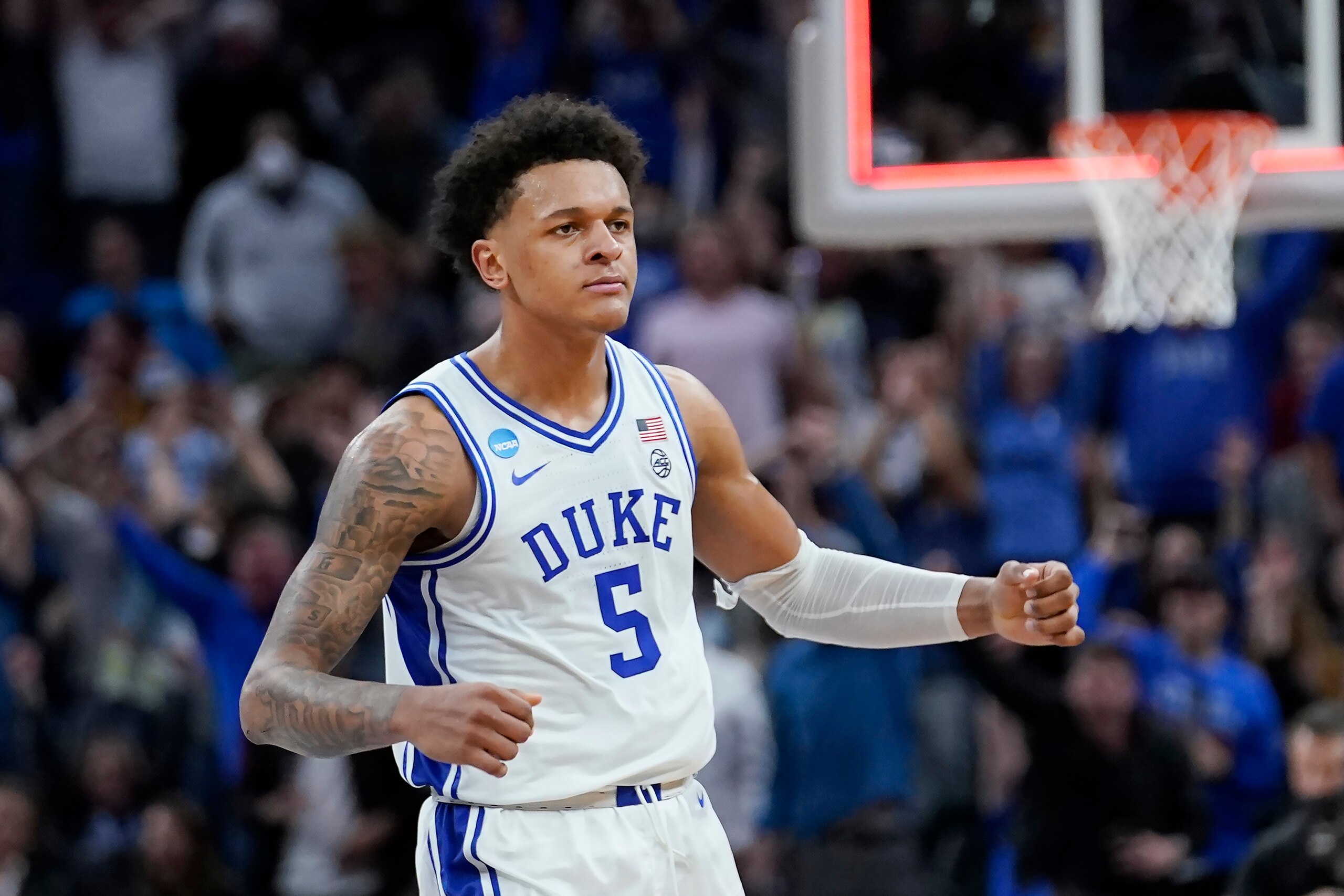 Duke forward Paolo Banchero (5) celebrates during the first half of a college basketball game against Arkansas in the Elite 8 round of the NCAA men's tournament in San Francisco, Saturday, March 26, 2022. (AP Photo/Marcio Jose Sanchez)