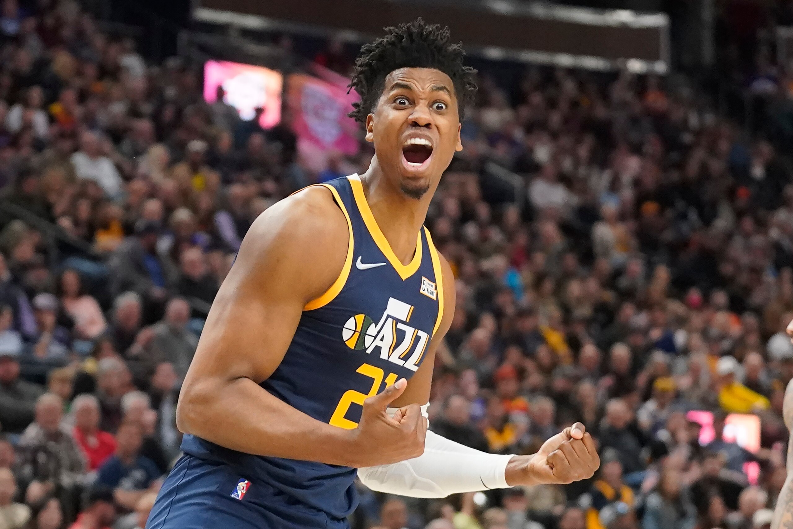 Utah Jazz center Hassan Whiteside (21) reacts during in the first half of an NBA basketball game against the Memphis Grizzlies, Tuesday, April 5, 2022, in Salt Lake City. (AP Photo/Rick Bowmer)