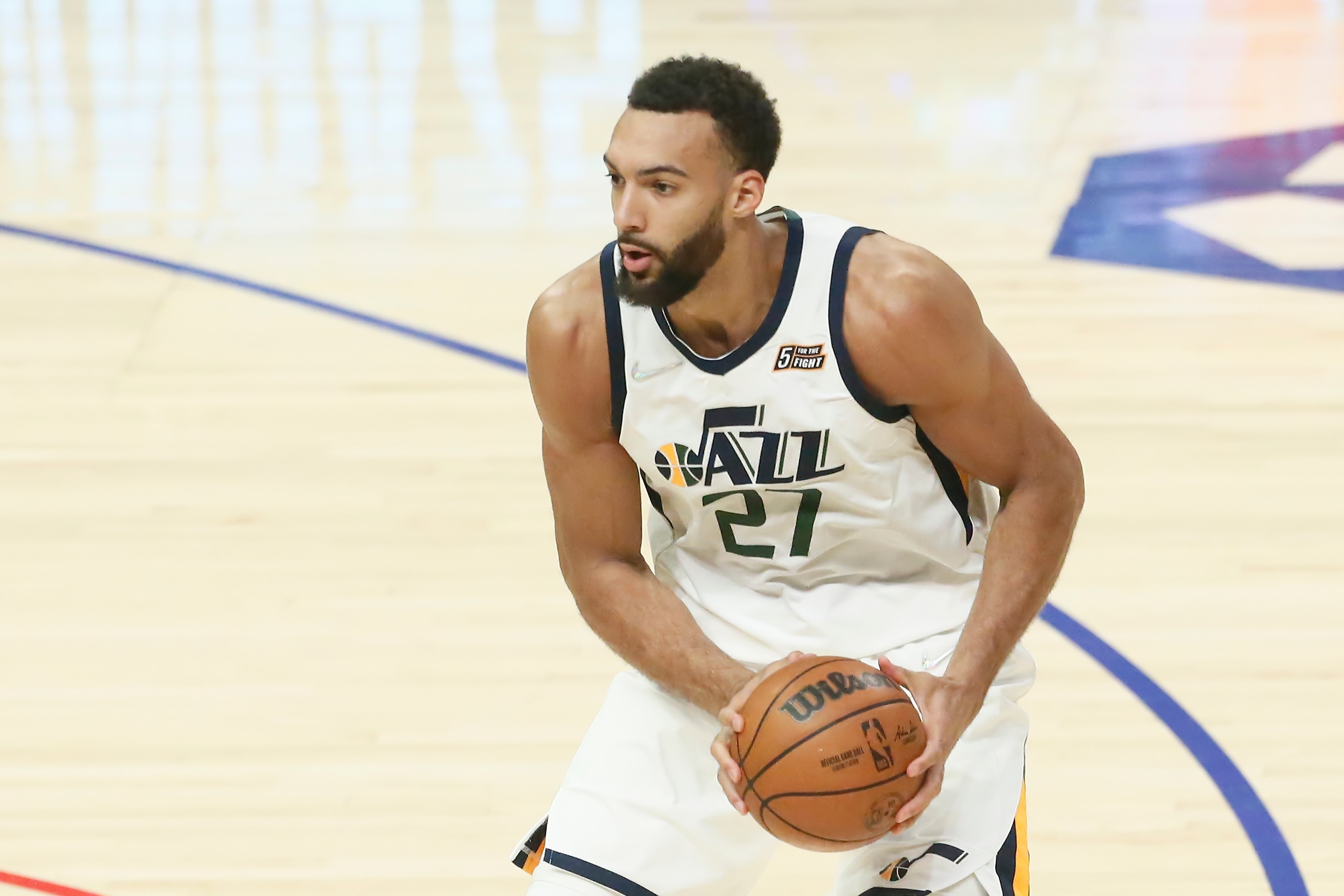 LOS ANGELES, CA - MARCH 29: Rudy Gobert #27 of the Utah Jazz dribbles the ball during a game at the Crypto.com Arena on March 29, 2022 in Los Angeles, California. NOTE TO USER: User expressly acknowledges and agrees that, by downloading and or using this photograph, User is consenting to the terms and conditions of the Getty Images License Agreement. Mandatory Credit: 2022 NBAE (Photo by Chris Elise/NBAE via Getty Images)