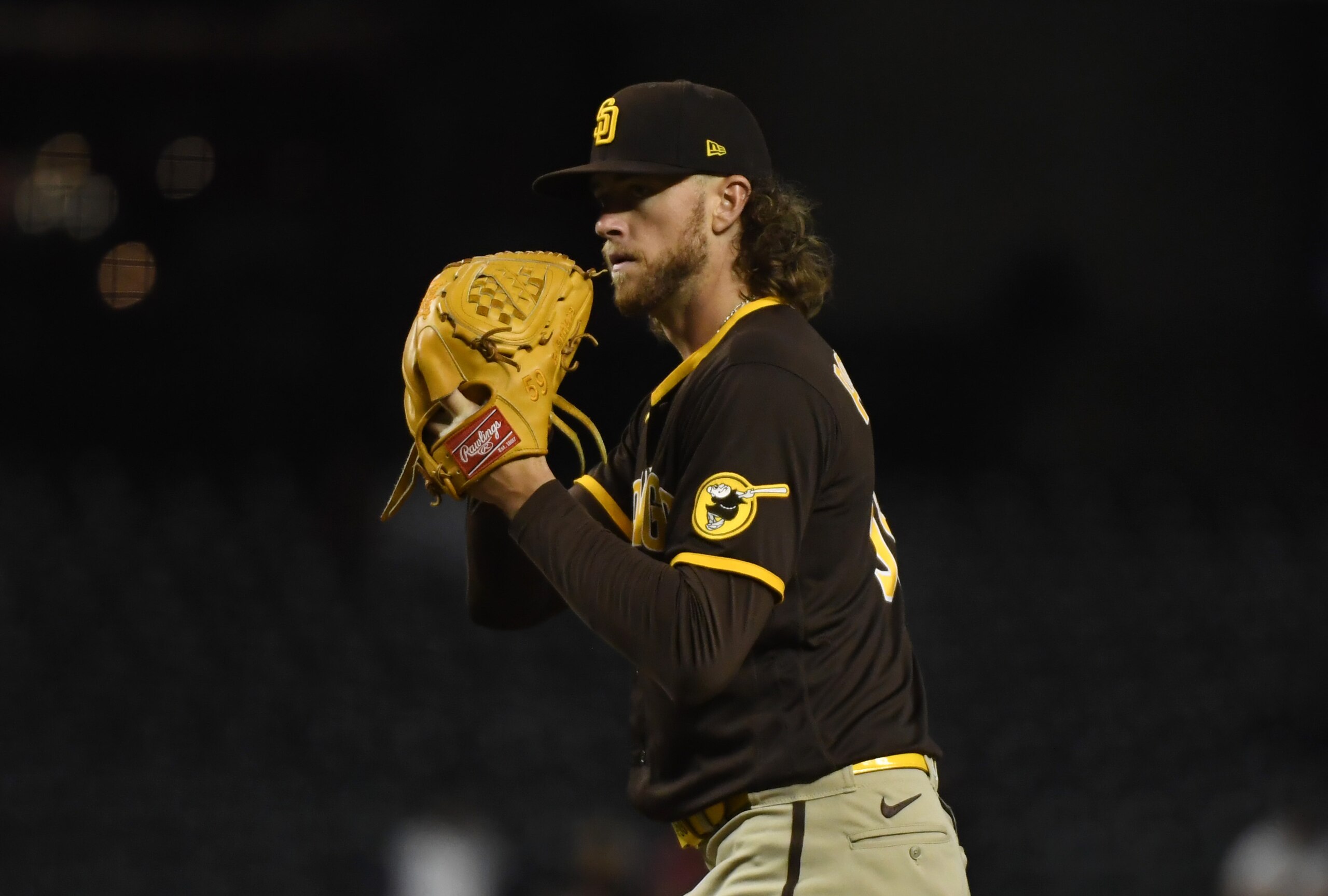 PHOENIX, ARIZONA - AUGUST 30: Chris Paddack #59 of the San Diego Padres prepares to deliver a first inning pitch against the Arizona Diamondbacks at Chase Field on August 30, 2021 in Phoenix, Arizona. (Photo by Norm Hall/Getty Images)