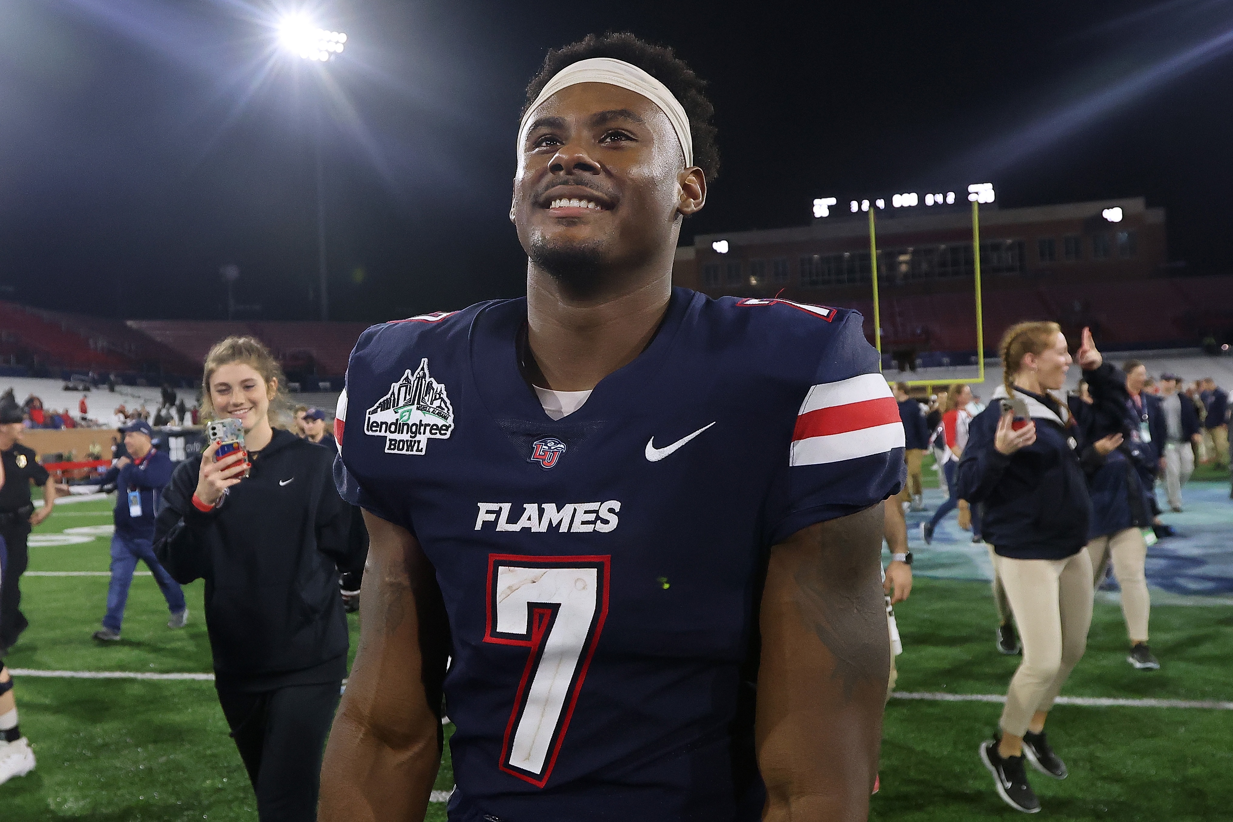 MOBILE, ALABAMA - DECEMBER 18: Malik Willis #7 of the Liberty Flames reacts during the LendingTree Bowl at Hancock Whitney Stadium on December 18, 2021 in Mobile, Alabama. (Photo by Jonathan Bachman/Getty Images)