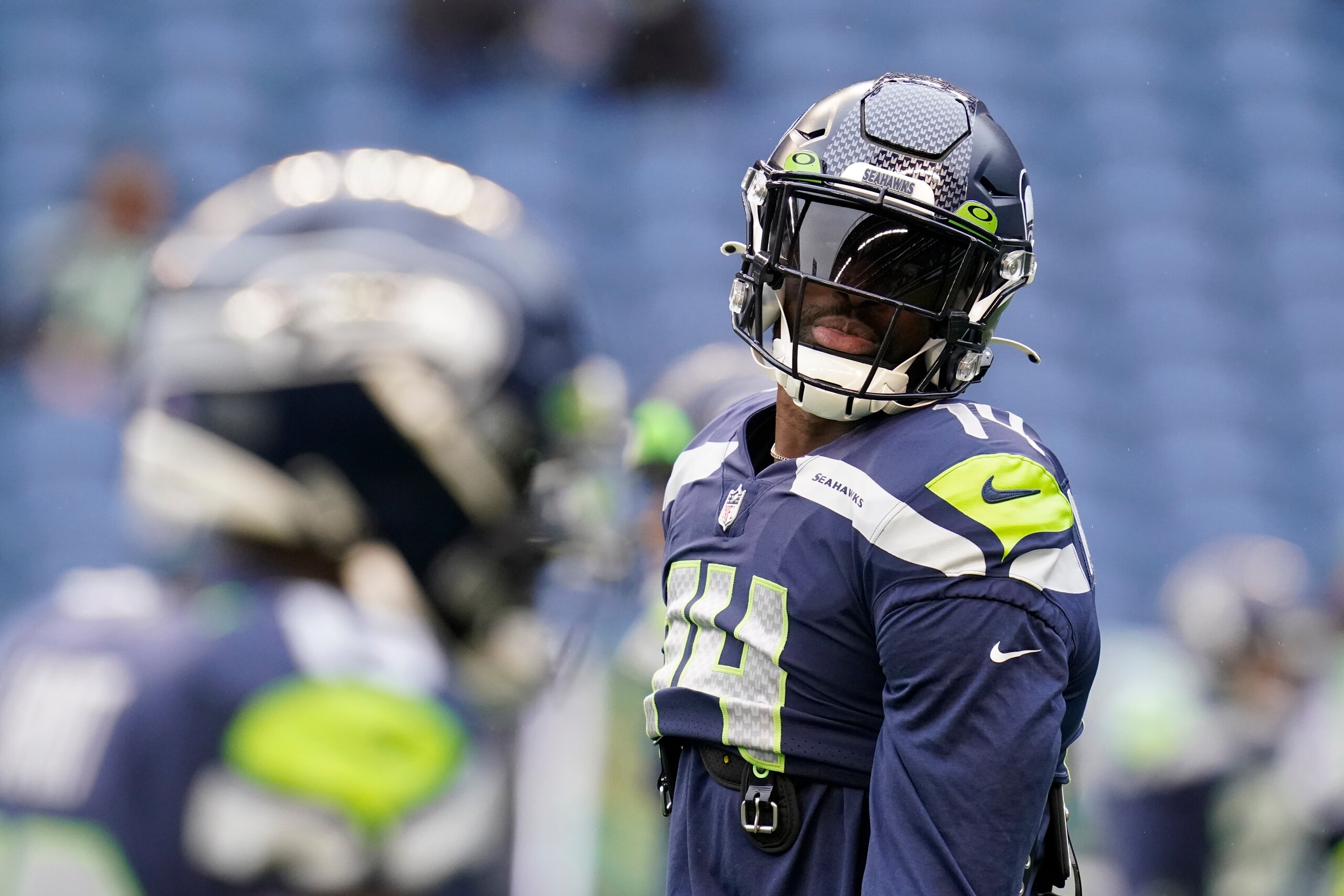 Seattle Seahawks wide receiver DK Metcalf (14) on the field before an NFL football game against the Detroit Lions, Sunday, Jan. 2, 2022, in Seattle. (AP Photo/Elaine Thompson)