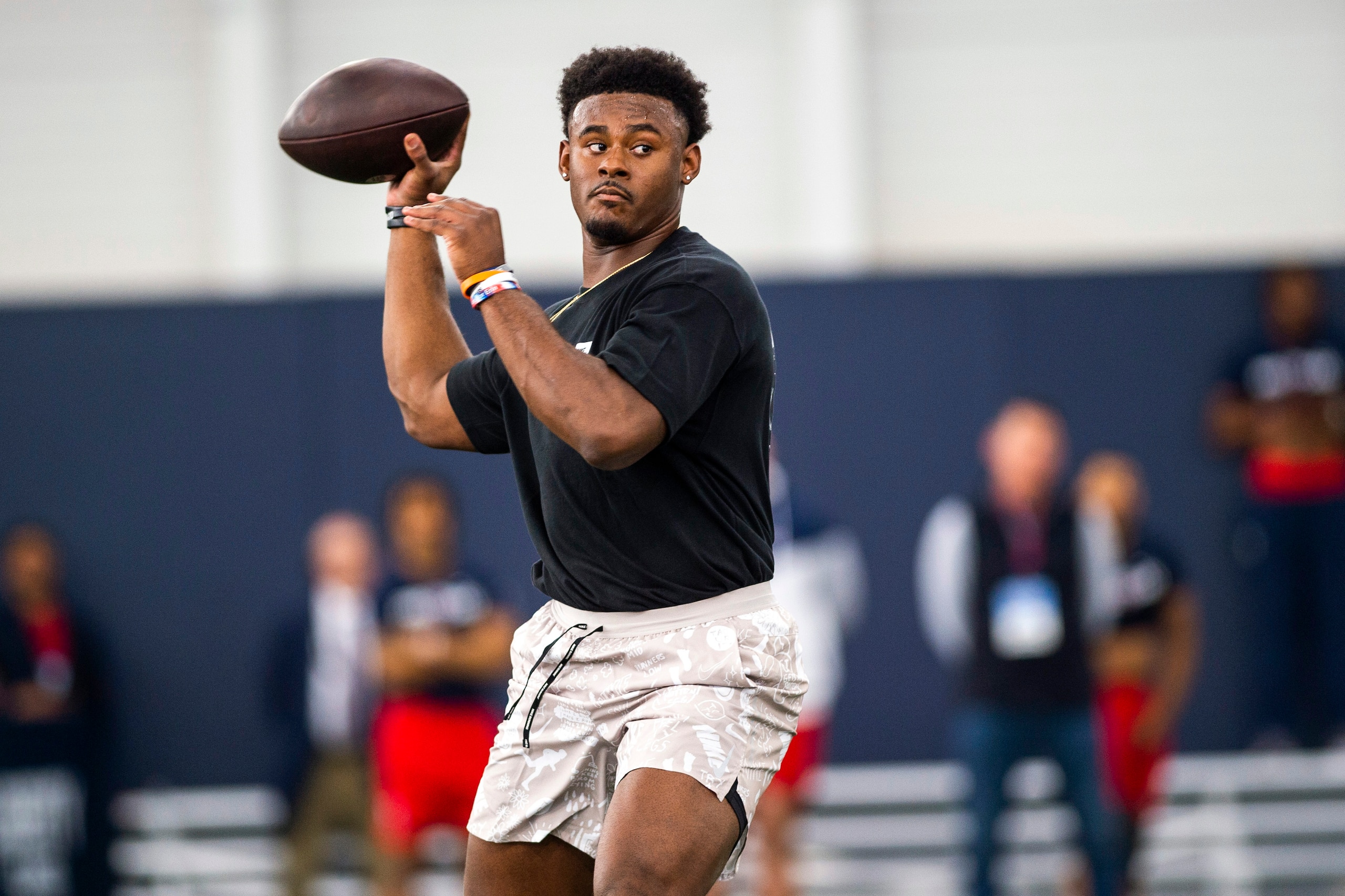 Liberty quarterback Malik Willis throws during the school's pro football day for NFL scouts and coaches, Tuesday, March 22, 2022, in Lynchburg, Va. (AP Photo/Kendall Warner)