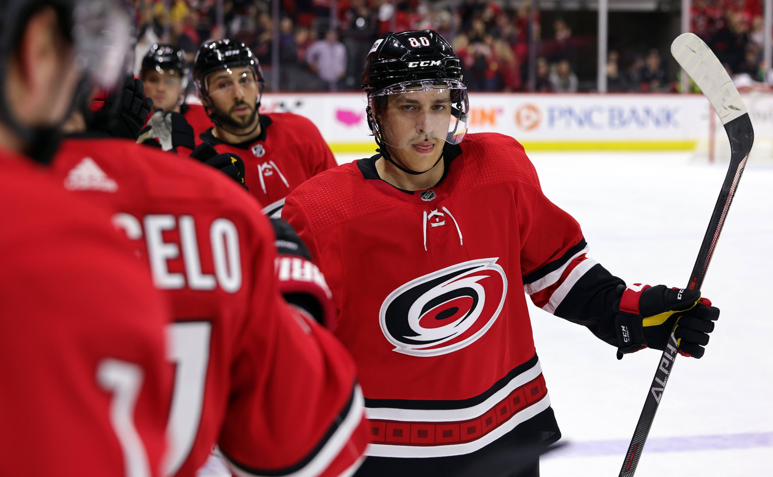 RALEIGH, NC - APRIL 7: Teuvo Teravainen #86 of the Carolina Hurricanes scores a goal and skates back to the bench to celebrate with teammates during an NHL game against the Buffalo Sabres on April 7, 2022 at PNC Arena in Raleigh, North Carolina. (Photo by Gregg Forwerck/NHLI via Getty Images) RALEIGH, NC - APRIL 7: Teuvo Teravainen #86 of the Carolina Hurricanes scores a goal and skates back to the bench to celebrate with teammates during an NHL game against the Buffalo Sabres on April 7, 2022 at PNC Arena in Raleigh, North Carolina. (Photo by Gregg Forwerck/NHLI via Getty Images)