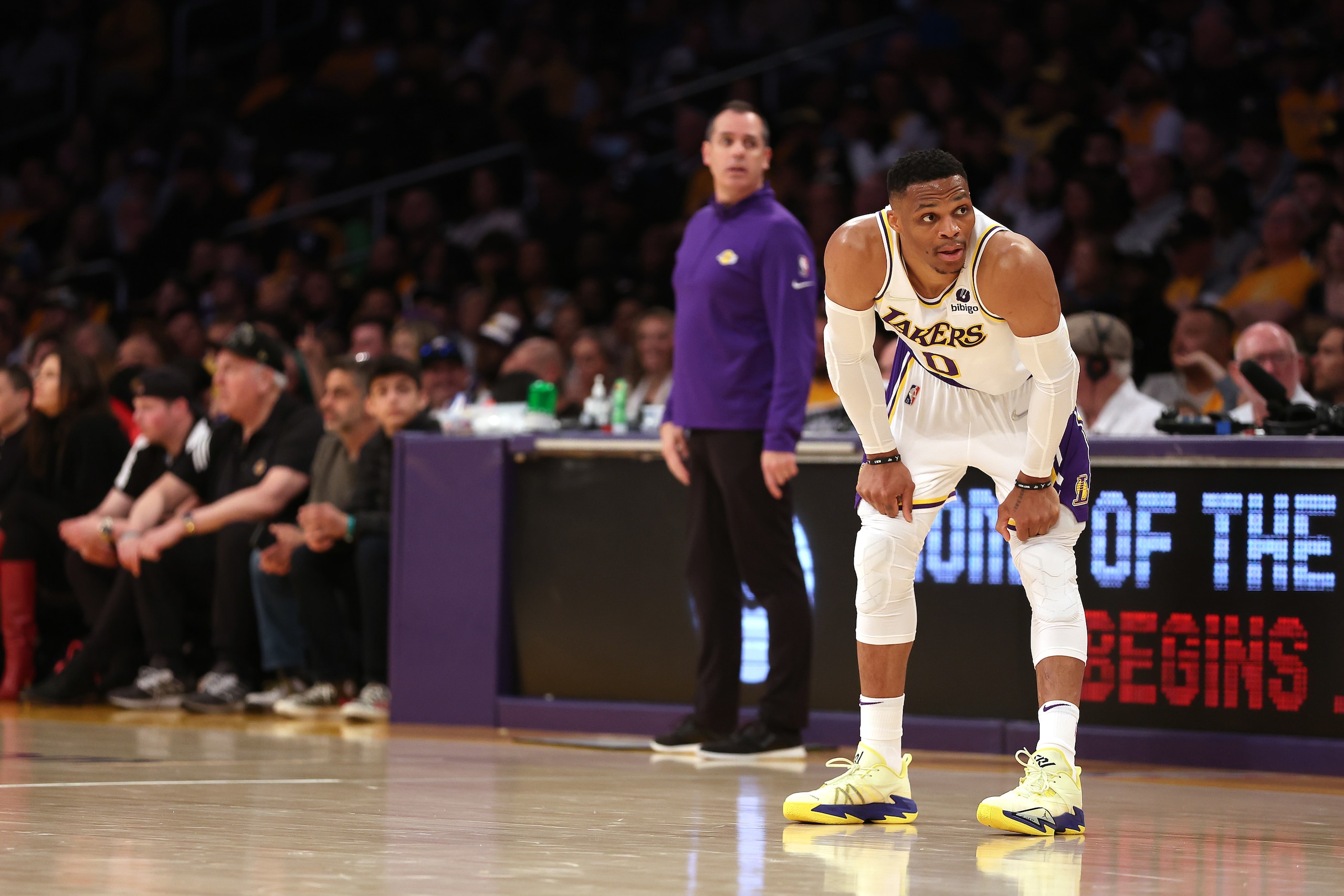 LOS ANGELES, CALIFORNIA - APRIL 03: Russell Westbrook #0 of the Los Angeles Lakers looks on during the first half of a game against the Denver Nuggets at Crypto.com Arena on April 03, 2022 in Los Angeles, California. NOTE TO USER: User expressly acknowledges and agrees that, by downloading and/or using this Photograph, user is consenting to the terms and conditions of the Getty Images License Agreement. Mandatory Copyright Notice: Copyright 2022 NBAE (Photo by Sean M. Haffey/Getty Images)