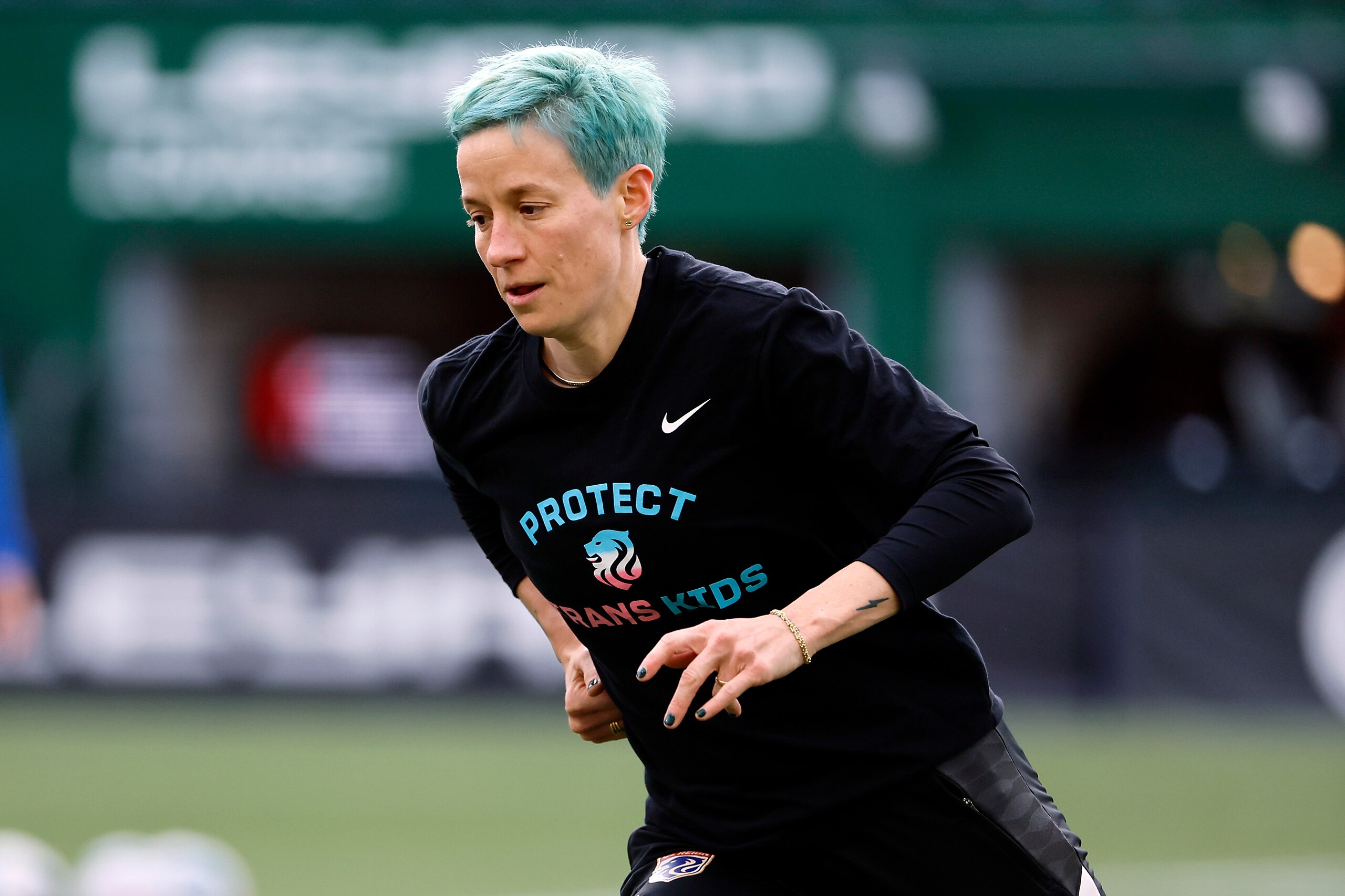 PORTLAND, OREGON - APRIL 02: Megan Rapinoe #15 of the OL Reign warms up before a match against the Portland Thorns at Providence Park on April 02, 2022 in Portland, Oregon. (Photo by Soobum Im/Getty Images)